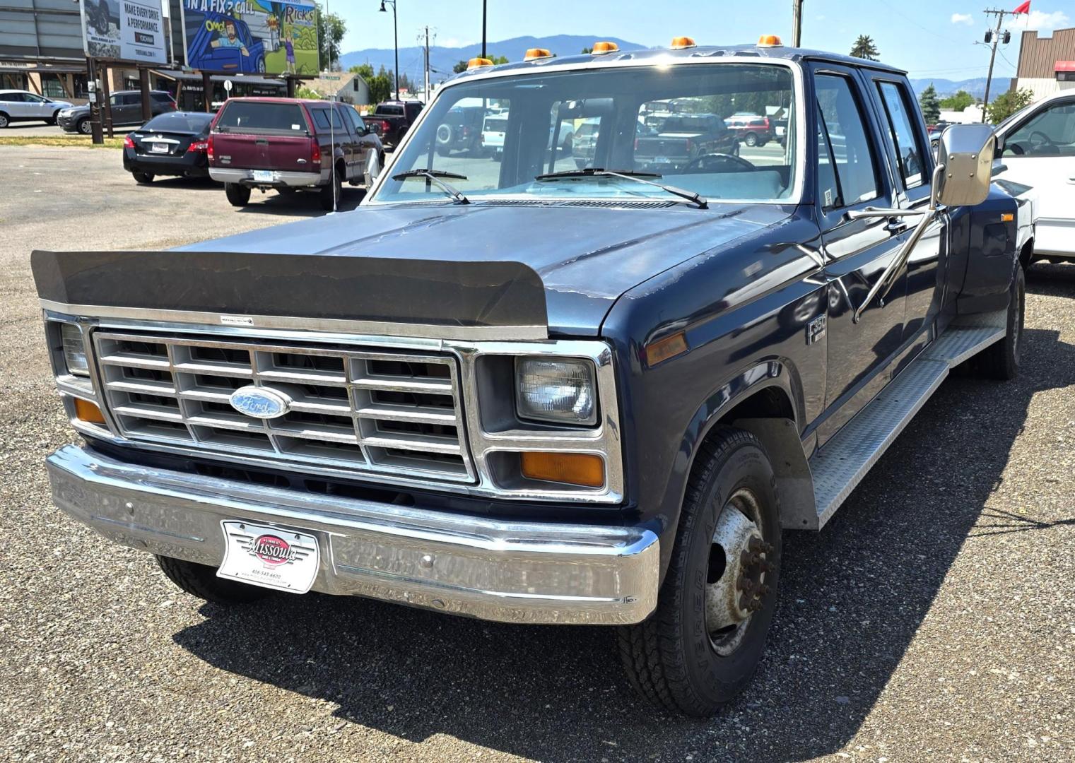 1986 Blue /Blue Ford F-350 Base (2FTJW35LXGC) with an 7.5L V8 OHV 16V engine, Automatic transmission, located at 450 N Russell, Missoula, MT, 59801, (406) 543-6600, 46.874496, -114.017433 - 1 Ton Dually Long Box CrewCab. Rear Wheel Drive. 7.5 Liter V8. Automatic Transmission. 43,284 Original Miles. Interior is close to Perfect. Even the headliner is immaculate. Clear Coat is pealing some. Left Rear Fender has some damage. This vehicle is more then 20 years old and is not eligible f - Photo#2