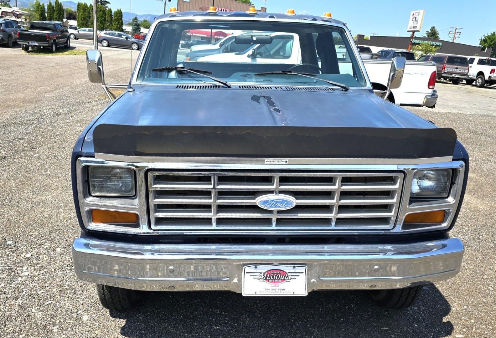 1986 Blue /Blue Ford F-350 Base (2FTJW35LXGC) with an 7.5L V8 OHV 16V engine, Automatic transmission, located at 450 N Russell, Missoula, MT, 59801, (406) 543-6600, 46.874496, -114.017433 - 1 Ton Dually Long Box CrewCab. Rear Wheel Drive. 7.5 Liter V8. Automatic Transmission. 43,284 Original Miles. Interior is close to Perfect. Even the headliner is immaculate. Clear Coat is pealing some. Left Rear Fender has some damage. This vehicle is more then 20 years old and is not eligible f - Photo#3