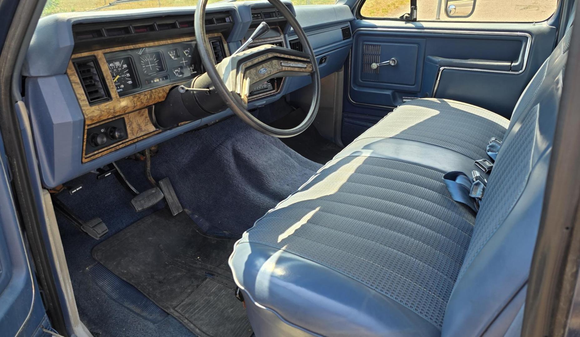 1986 Blue /Blue Ford F-350 Base (2FTJW35LXGC) with an 7.5L V8 OHV 16V engine, Automatic transmission, located at 450 N Russell, Missoula, MT, 59801, (406) 543-6600, 46.874496, -114.017433 - 1 Ton Dually Long Box CrewCab. Rear Wheel Drive. 7.5 Liter V8. Automatic Transmission. 43,284 Original Miles. Interior is close to Perfect. Even the headliner is immaculate. Clear Coat is pealing some. Left Rear Fender has some damage. This vehicle is more then 20 years old and is not eligible f - Photo#9