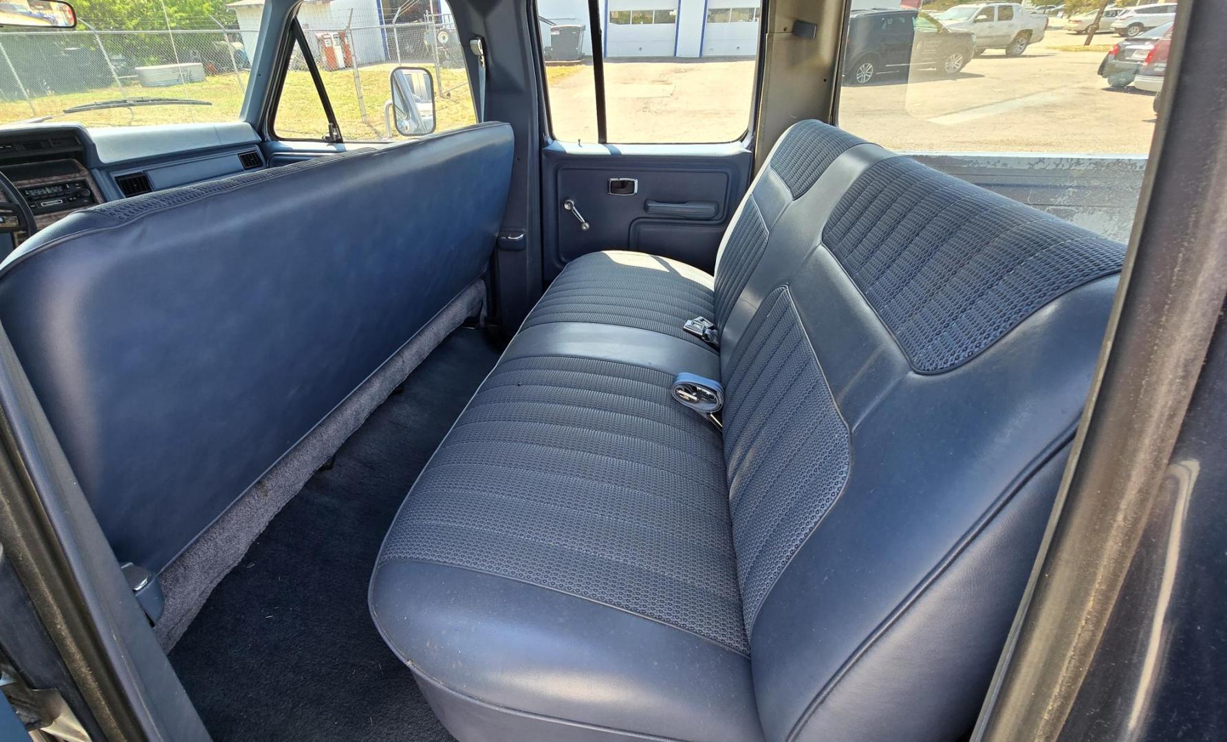 1986 Blue /Blue Ford F-350 Base (2FTJW35LXGC) with an 7.5L V8 OHV 16V engine, Automatic transmission, located at 450 N Russell, Missoula, MT, 59801, (406) 543-6600, 46.874496, -114.017433 - 1 Ton Dually Long Box CrewCab. Rear Wheel Drive. 7.5 Liter V8. Automatic Transmission. 43,284 Original Miles. Interior is close to Perfect. Even the headliner is immaculate. Clear Coat is pealing some. Left Rear Fender has some damage. This vehicle is more then 20 years old and is not eligible f - Photo#10