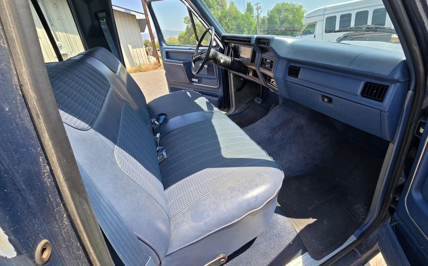 1986 Blue /Blue Ford F-350 Base (2FTJW35LXGC) with an 7.5L V8 OHV 16V engine, Automatic transmission, located at 450 N Russell, Missoula, MT, 59801, (406) 543-6600, 46.874496, -114.017433 - 1 Ton Dually Long Box CrewCab. Rear Wheel Drive. 7.5 Liter V8. Automatic Transmission. 43,284 Original Miles. Interior is close to Perfect. Even the headliner is immaculate. Clear Coat is pealing some. Left Rear Fender has some damage. This vehicle is more then 20 years old and is not eligible f - Photo#14