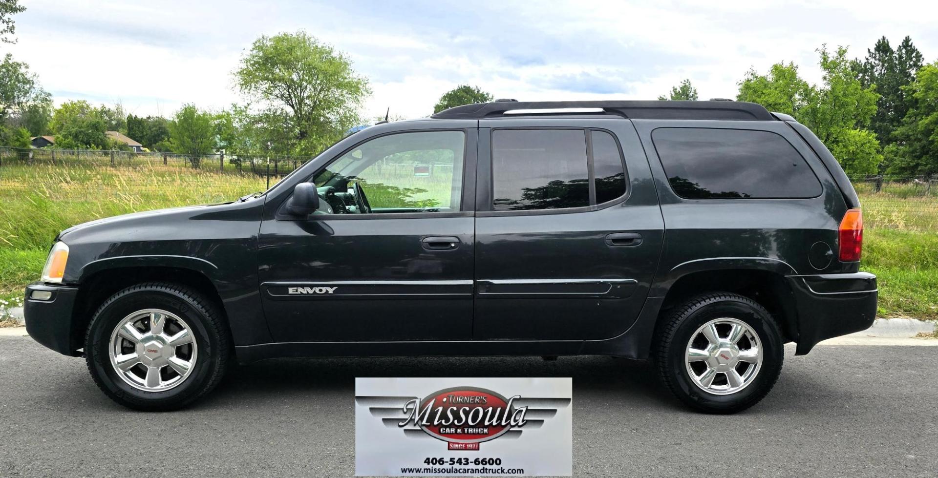 2004 Black /Gray GMC Envoy XL SLE 2WD (1GKES16S446) with an 4.2L L6 DOHC 24V engine, 4-Speed Automatic Overdrive transmission, located at 450 N Russell, Missoula, MT, 59801, (406) 543-6600, 46.874496, -114.017433 - Very Straight 2WD SUV. 4.2L V6 Engine. Automatic Transmission. 3rd Row Seating. Front and Rear Climate Control. Air. Cruise. Tilt. Power Windows and Locks. Power Drivers Seat. Towing. AM FM CD Player. Because of the age, our Lenders do NOT offer financing on this vehicle. - Photo#1