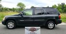 2004 Black /Gray GMC Envoy XL SLE 2WD (1GKES16S446) with an 4.2L L6 DOHC 24V engine, 4-Speed Automatic Overdrive transmission, located at 450 N Russell, Missoula, MT, 59801, (406) 543-6600, 46.874496, -114.017433 - Very Straight 2WD SUV. 4.2L V6 Engine. Automatic Transmission. 3rd Row Seating. Front and Rear Climate Control. Air. Cruise. Tilt. Power Windows and Locks. Power Drivers Seat. Towing. AM FM CD Player. Because of the age, our Lenders do NOT offer financing on this vehicle. - Photo#1