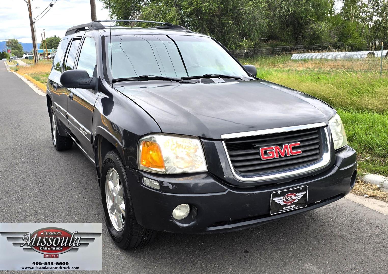 2004 Black /Gray GMC Envoy XL SLE 2WD (1GKES16S446) with an 4.2L L6 DOHC 24V engine, 4-Speed Automatic Overdrive transmission, located at 450 N Russell, Missoula, MT, 59801, (406) 543-6600, 46.874496, -114.017433 - Very Straight 2WD SUV. 4.2L V6 Engine. Automatic Transmission. 3rd Row Seating. Front and Rear Climate Control. Air. Cruise. Tilt. Power Windows and Locks. Power Drivers Seat. Towing. AM FM CD Player. Because of the age, our Lenders do NOT offer financing on this vehicle. - Photo#3