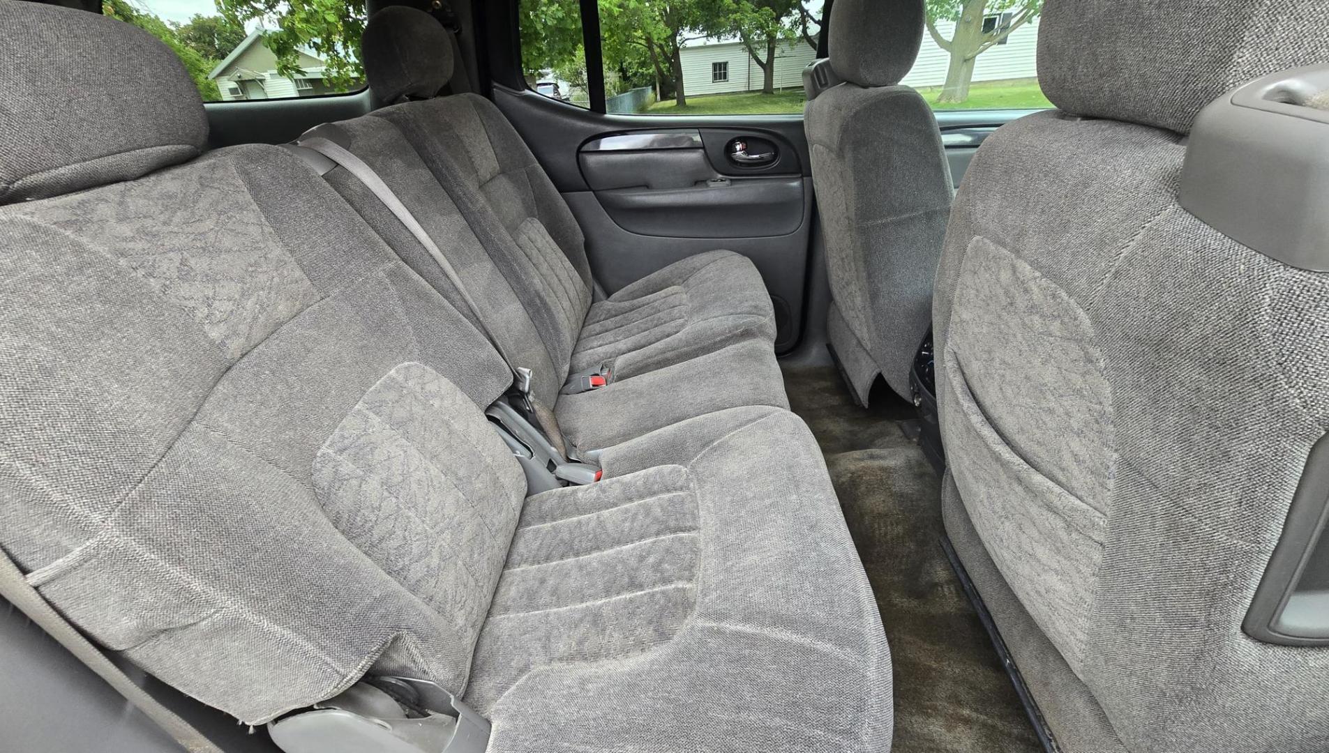 2004 Black /Gray GMC Envoy XL SLE 2WD (1GKES16S446) with an 4.2L L6 DOHC 24V engine, 4-Speed Automatic Overdrive transmission, located at 450 N Russell, Missoula, MT, 59801, (406) 543-6600, 46.874496, -114.017433 - Very Straight 2WD SUV. 4.2L V6 Engine. Automatic Transmission. 3rd Row Seating. Front and Rear Climate Control. Air. Cruise. Tilt. Power Windows and Locks. Power Drivers Seat. Towing. AM FM CD Player. Because of the age, our Lenders do NOT offer financing on this vehicle. - Photo#8