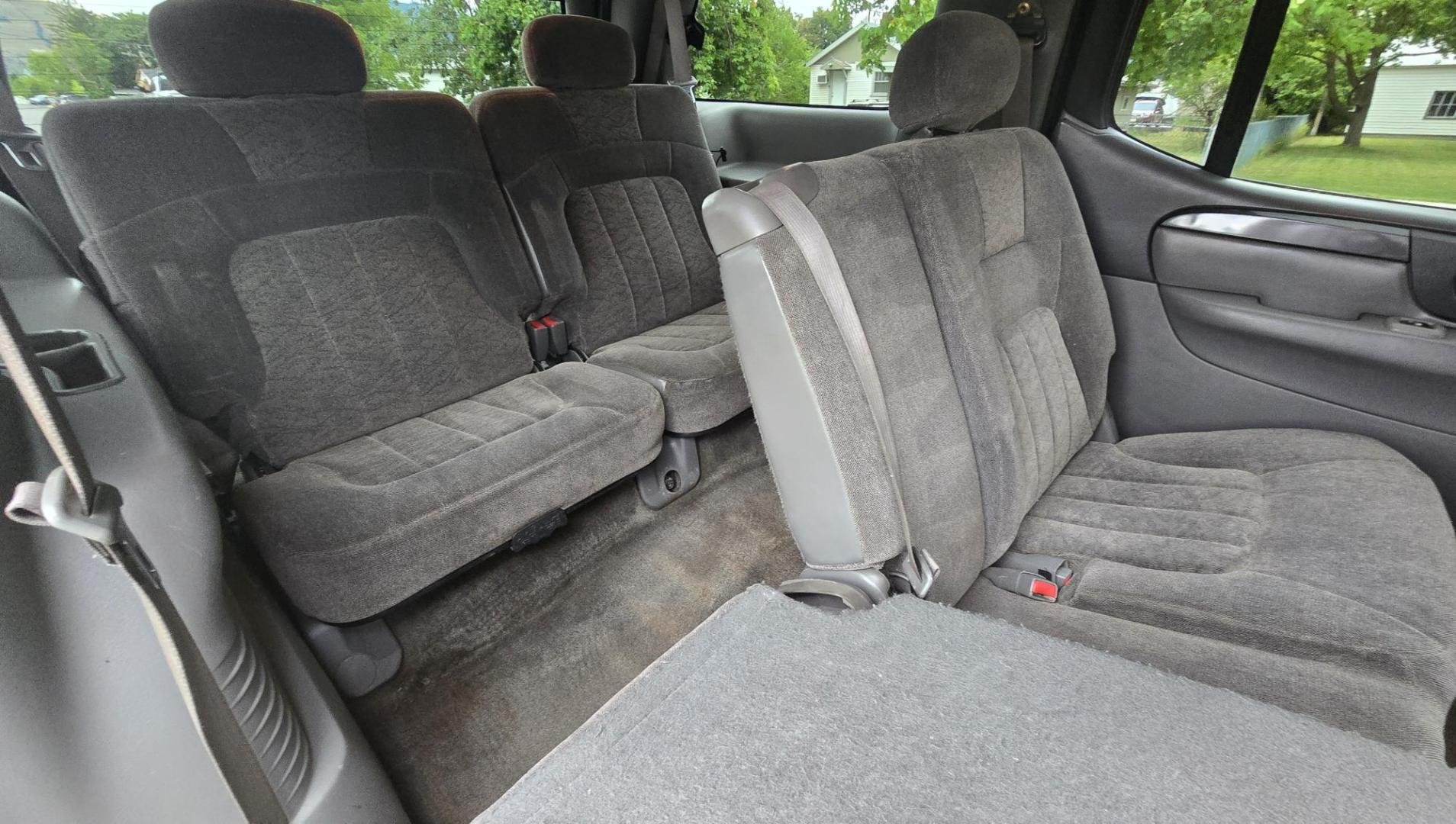 2004 Black /Gray GMC Envoy XL SLE 2WD (1GKES16S446) with an 4.2L L6 DOHC 24V engine, 4-Speed Automatic Overdrive transmission, located at 450 N Russell, Missoula, MT, 59801, (406) 543-6600, 46.874496, -114.017433 - Very Straight 2WD SUV. 4.2L V6 Engine. Automatic Transmission. 3rd Row Seating. Front and Rear Climate Control. Air. Cruise. Tilt. Power Windows and Locks. Power Drivers Seat. Towing. AM FM CD Player. Because of the age, our Lenders do NOT offer financing on this vehicle. - Photo#9