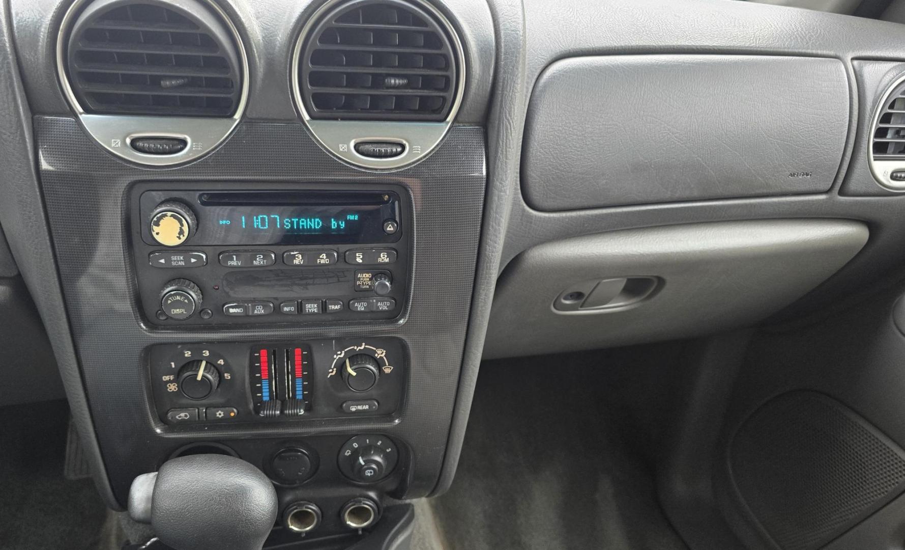 2004 Black /Gray GMC Envoy XL SLE 2WD (1GKES16S446) with an 4.2L L6 DOHC 24V engine, 4-Speed Automatic Overdrive transmission, located at 450 N Russell, Missoula, MT, 59801, (406) 543-6600, 46.874496, -114.017433 - Very Straight 2WD SUV. 4.2L V6 Engine. Automatic Transmission. 3rd Row Seating. Front and Rear Climate Control. Air. Cruise. Tilt. Power Windows and Locks. Power Drivers Seat. Towing. AM FM CD Player. Because of the age, our Lenders do NOT offer financing on this vehicle. - Photo#13