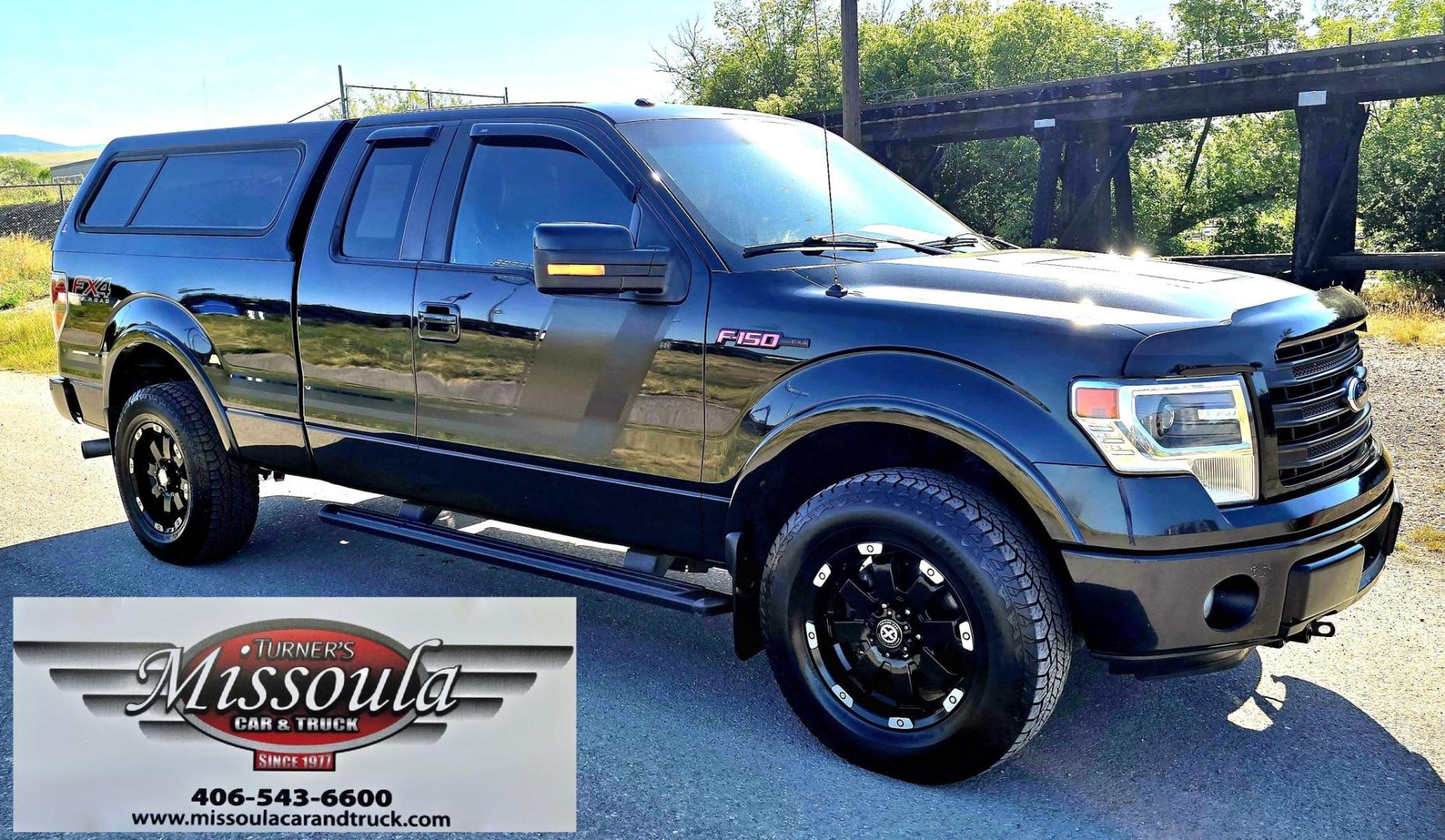 2014 Black /Black Ford F-150 FX4 SuperCab 6.5-ft. Bed 4WD (1FTFX1ET2EF) with an 3.5L V6 TURBO engine, 6-Speed Automatic transmission, located at 450 N Russell, Missoula, MT, 59801, (406) 543-6600, 46.874496, -114.017433 - Metallic Black 1/2 Ton 4WD. 3.5L V6 EcoBoost Engine. Excellent Condition. Leather Heated Seats. Power Front Seats. Power Sunroof. Air. Cruise. Tilt. Navigation. Backup Camera. AM FM SAT CD. Bluetooth. Running Boards. Towing. Nice Matching Topper. Fancy Custom Wheels. We Finance through local Cre - Photo#2