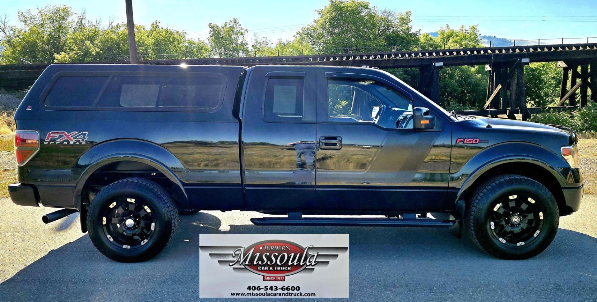 2014 Black /Black Ford F-150 FX4 SuperCab 6.5-ft. Bed 4WD (1FTFX1ET2EF) with an 3.5L V6 TURBO engine, 6-Speed Automatic transmission, located at 450 N Russell, Missoula, MT, 59801, (406) 543-6600, 46.874496, -114.017433 - Metallic Black 1/2 Ton 4WD. 3.5L V6 EcoBoost Engine. Excellent Condition. Leather Heated Seats. Power Front Seats. Power Sunroof. Air. Cruise. Tilt. Navigation. Backup Camera. AM FM SAT CD. Bluetooth. Running Boards. Towing. Nice Matching Topper. Fancy Custom Wheels. We Finance through local Cre - Photo#1