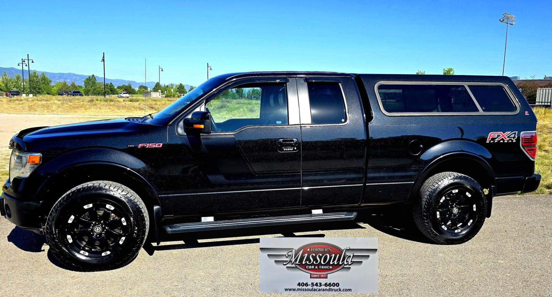 2014 Black /Black Ford F-150 FX4 SuperCab 6.5-ft. Bed 4WD (1FTFX1ET2EF) with an 3.5L V6 TURBO engine, 6-Speed Automatic transmission, located at 450 N Russell, Missoula, MT, 59801, (406) 543-6600, 46.874496, -114.017433 - Metallic Black 1/2 Ton 4WD. 3.5L V6 EcoBoost Engine. Excellent Condition. Leather Heated Seats. Power Front Seats. Power Sunroof. Air. Cruise. Tilt. Navigation. Backup Camera. AM FM SAT CD. Bluetooth. Running Boards. Towing. Nice Matching Topper. Fancy Custom Wheels. We Finance through local Cre - Photo#0
