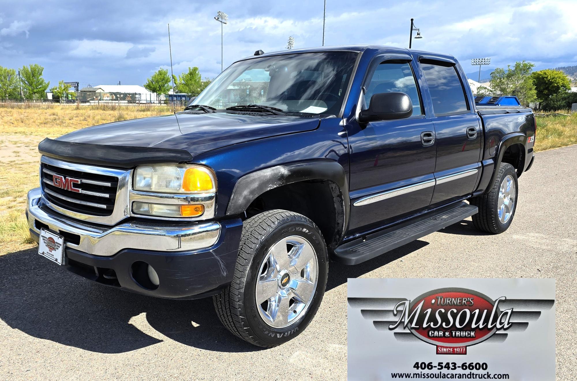 photo of 2005 GMC Sierra 1500 SLE Crew Cab Short Bed 4WD