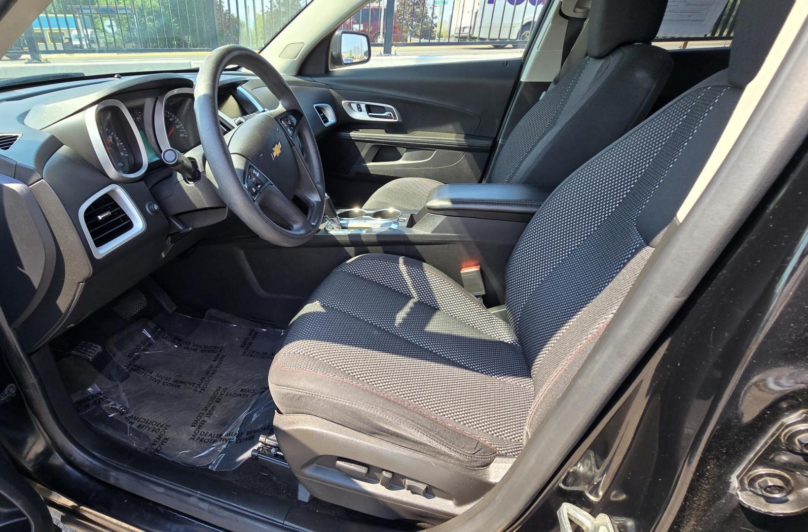 2016 Black /GRAY Chevrolet Equinox LS AWD (2GNFLEEK0G6) with an 2.4L L4 DOHC 16V FFV engine, 6A transmission, located at 450 N Russell, Missoula, MT, 59801, (406) 543-6600, 46.874496, -114.017433 - Reliable AWD SUV at a great price. 2.4L I4 Engine. Automatic Transmission. Air. Cruise Tilt. Bluetooth Audio and Phone. AM FM SAT. Backup Camera. Power Drivers Seat. Interior is near perfect. Clean Title and Carfax. - Photo#12