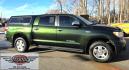 2013 Green /Gray Toyota Tundra Limited 5.7L CrewMax 4WD (5TFHY5F18DX) with an 5.7L V8 DOHC 32V engine, 6-Speed Automatic Overdrive transmission, located at 450 N Russell, Missoula, MT, 59801, (406) 543-6600, 46.874496, -114.017433 - Reliable 4WD Tundra Limited. 5.7L V8 Engine. 6 Speed Automatic Transmission. It's a Crewmax so there is a crazy amount of room in the Cab. Power Heated Front Seats. Power Sunroof. Backup Camera. Air. Cruise. Tilt. AM FM CD. Bluetooth. Backup Camera. Running Boards. Comes with a Nice Topper. Toyota - Photo#1