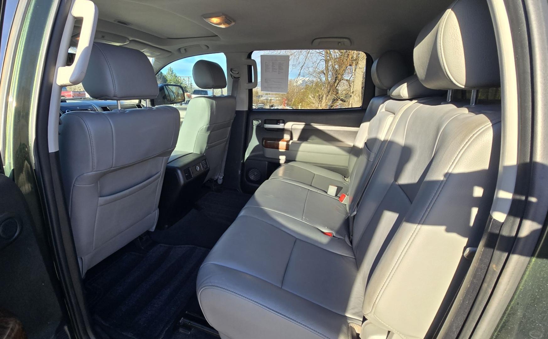 2013 Green /Gray Toyota Tundra Limited 5.7L CrewMax 4WD (5TFHY5F18DX) with an 5.7L V8 DOHC 32V engine, 6-Speed Automatic Overdrive transmission, located at 450 N Russell, Missoula, MT, 59801, (406) 543-6600, 46.874496, -114.017433 - Reliable 4WD Tundra Limited. 5.7L V8 Engine. 6 Speed Automatic Transmission. It's a Crewmax so there is a crazy amount of room in the Cab. Power Heated Front Seats. Power Sunroof. Backup Camera. Air. Cruise. Tilt. AM FM CD. Bluetooth. Backup Camera. Running Boards. Comes with a Nice Topper. Toyota - Photo#9