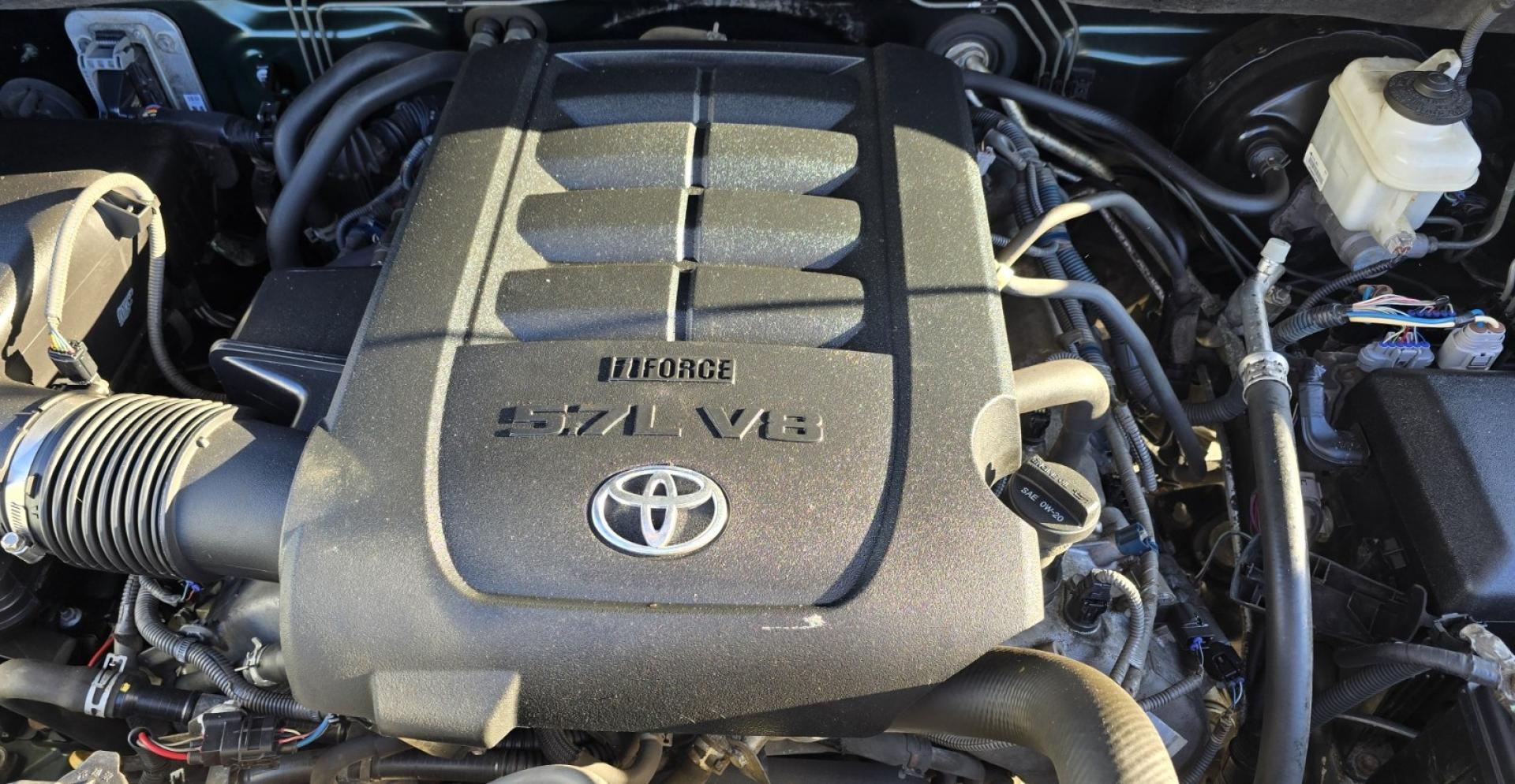 2013 Green /Gray Toyota Tundra Limited 5.7L CrewMax 4WD (5TFHY5F18DX) with an 5.7L V8 DOHC 32V engine, 6-Speed Automatic Overdrive transmission, located at 450 N Russell, Missoula, MT, 59801, (406) 543-6600, 46.874496, -114.017433 - Reliable 4WD Tundra Limited. 5.7L V8 Engine. 6 Speed Automatic Transmission. It's a Crewmax so there is a crazy amount of room in the Cab. Power Heated Front Seats. Power Sunroof. Backup Camera. Air. Cruise. Tilt. AM FM CD. Bluetooth. Backup Camera. Running Boards. Comes with a Nice Topper. Toyota - Photo#19