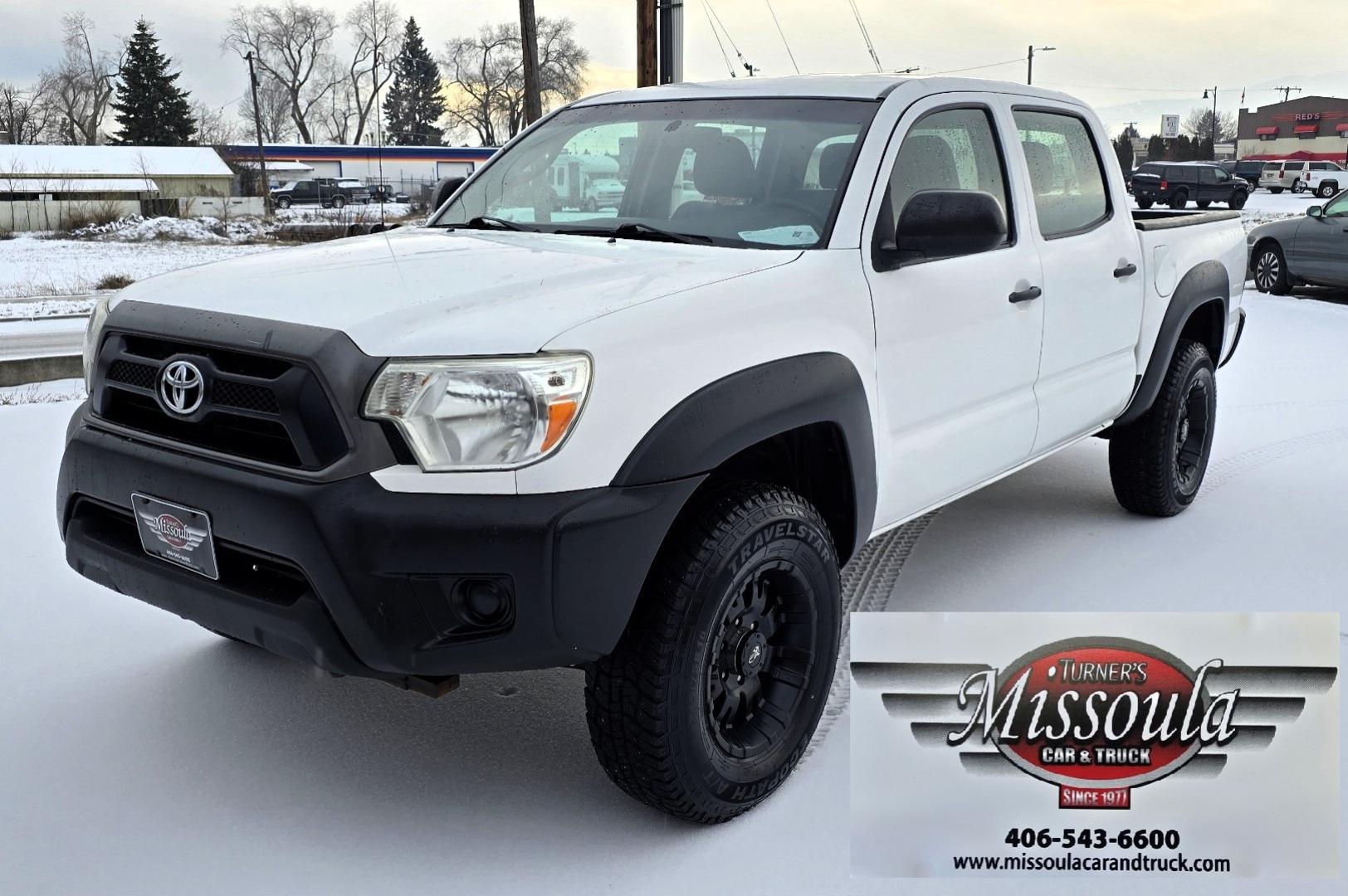 2012 White /Black Toyota Tacoma Double Cab V6 4WD (3TMLU4EN4CM) with an 4.0L V6 DOHC 24V engine, 6-Speed Automatic transmission, located at 450 N Russell, Missoula, MT, 59801, (406) 543-6600, 46.874496, -114.017433 - Very Reliable and Desirable 4WD Toyota Tacoma Crew Cab. 4.0L V6 Engine. 6 Speed Automatic Transmission. Air. Cruise. Tilt. Power Windows and Locks. AM FM CD Player. Body is straight. . Very minor rip in the drivers seat. Nice Tires and Wheels. We Finance through local Credit Unions. We do NOT of - Photo#3