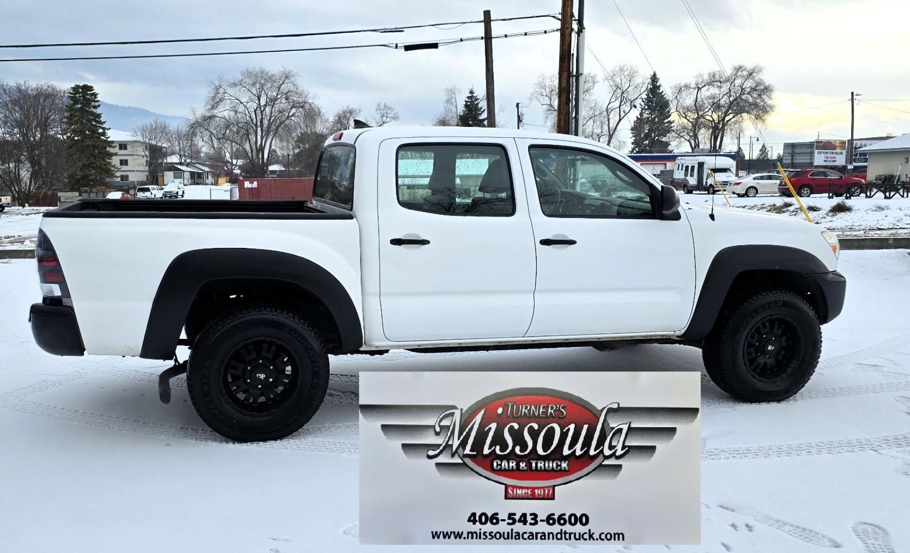 2012 White /Black Toyota Tacoma Double Cab V6 4WD (3TMLU4EN4CM) with an 4.0L V6 DOHC 24V engine, 6-Speed Automatic transmission, located at 450 N Russell, Missoula, MT, 59801, (406) 543-6600, 46.874496, -114.017433 - Very Reliable and Desirable 4WD Toyota Tacoma Crew Cab. 4.0L V6 Engine. 6 Speed Automatic Transmission. Air. Cruise. Tilt. Power Windows and Locks. AM FM CD Player. Body is straight. . Very minor rip in the drivers seat. Nice Tires and Wheels. We Finance through local Credit Unions. We do NOT of - Photo#7