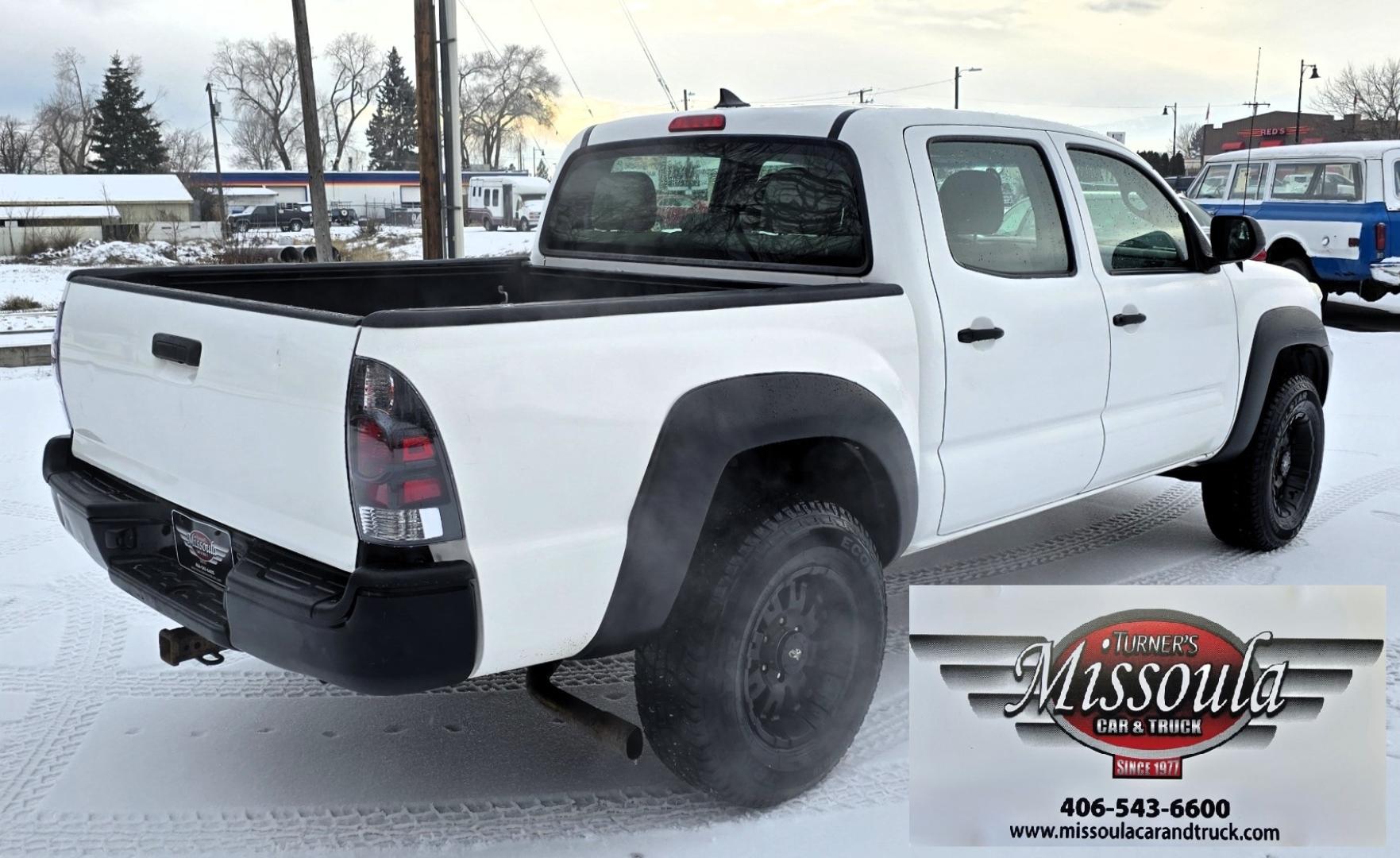 2012 White /Black Toyota Tacoma Double Cab V6 4WD (3TMLU4EN4CM) with an 4.0L V6 DOHC 24V engine, 6-Speed Automatic transmission, located at 450 N Russell, Missoula, MT, 59801, (406) 543-6600, 46.874496, -114.017433 - Very Reliable and Desirable 4WD Toyota Tacoma Crew Cab. 4.0L V6 Engine. 6 Speed Automatic Transmission. Air. Cruise. Tilt. Power Windows and Locks. AM FM CD Player. Body is straight. . Very minor rip in the drivers seat. Nice Tires and Wheels. We Finance through local Credit Unions. We do NOT of - Photo#8