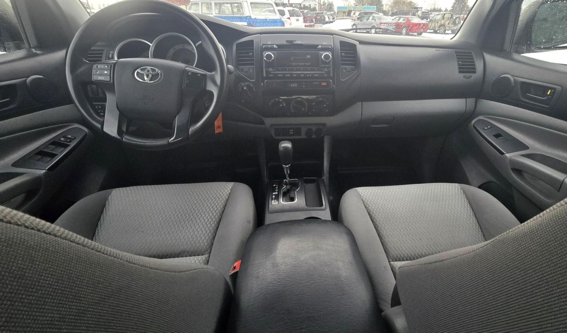 2012 White /Black Toyota Tacoma Double Cab V6 4WD (3TMLU4EN4CM) with an 4.0L V6 DOHC 24V engine, 6-Speed Automatic transmission, located at 450 N Russell, Missoula, MT, 59801, (406) 543-6600, 46.874496, -114.017433 - Very Reliable and Desirable 4WD Toyota Tacoma Crew Cab. 4.0L V6 Engine. 6 Speed Automatic Transmission. Air. Cruise. Tilt. Power Windows and Locks. AM FM CD Player. Body is straight. . Very minor rip in the drivers seat. Nice Tires and Wheels. We Finance through local Credit Unions. We do NOT of - Photo#11