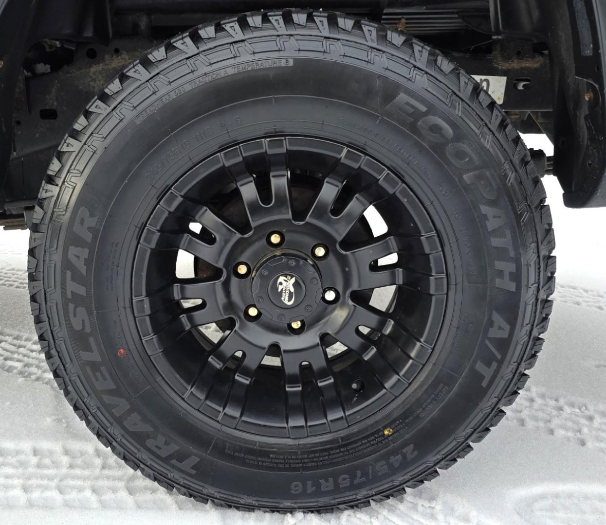 2012 White /Black Toyota Tacoma Double Cab V6 4WD (3TMLU4EN4CM) with an 4.0L V6 DOHC 24V engine, 6-Speed Automatic transmission, located at 450 N Russell, Missoula, MT, 59801, (406) 543-6600, 46.874496, -114.017433 - Very Reliable and Desirable 4WD Toyota Tacoma Crew Cab. 4.0L V6 Engine. 6 Speed Automatic Transmission. Air. Cruise. Tilt. Power Windows and Locks. AM FM CD Player. Body is straight. . Very minor rip in the drivers seat. Nice Tires and Wheels. We Finance through local Credit Unions. We do NOT of - Photo#14