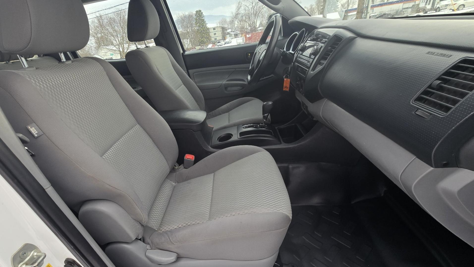 2012 White /Black Toyota Tacoma Double Cab V6 4WD (3TMLU4EN4CM) with an 4.0L V6 DOHC 24V engine, 6-Speed Automatic transmission, located at 450 N Russell, Missoula, MT, 59801, (406) 543-6600, 46.874496, -114.017433 - Very Reliable and Desirable 4WD Toyota Tacoma Crew Cab. 4.0L V6 Engine. 6 Speed Automatic Transmission. Air. Cruise. Tilt. Power Windows and Locks. AM FM CD Player. Body is straight. . Very minor rip in the drivers seat. Nice Tires and Wheels. We Finance through local Credit Unions. We do NOT of - Photo#13