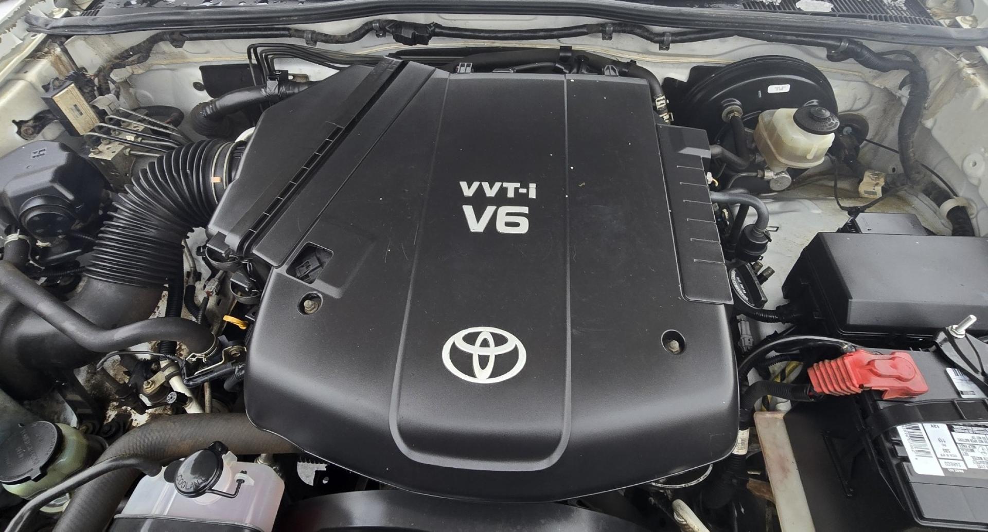 2012 White /Black Toyota Tacoma Double Cab V6 4WD (3TMLU4EN4CM) with an 4.0L V6 DOHC 24V engine, 6-Speed Automatic transmission, located at 450 N Russell, Missoula, MT, 59801, (406) 543-6600, 46.874496, -114.017433 - Very Reliable and Desirable 4WD Toyota Tacoma Crew Cab. 4.0L V6 Engine. 6 Speed Automatic Transmission. Air. Cruise. Tilt. Power Windows and Locks. AM FM CD Player. Body is straight. . Very minor rip in the drivers seat. Nice Tires and Wheels. We Finance through local Credit Unions. We do NOT of - Photo#17