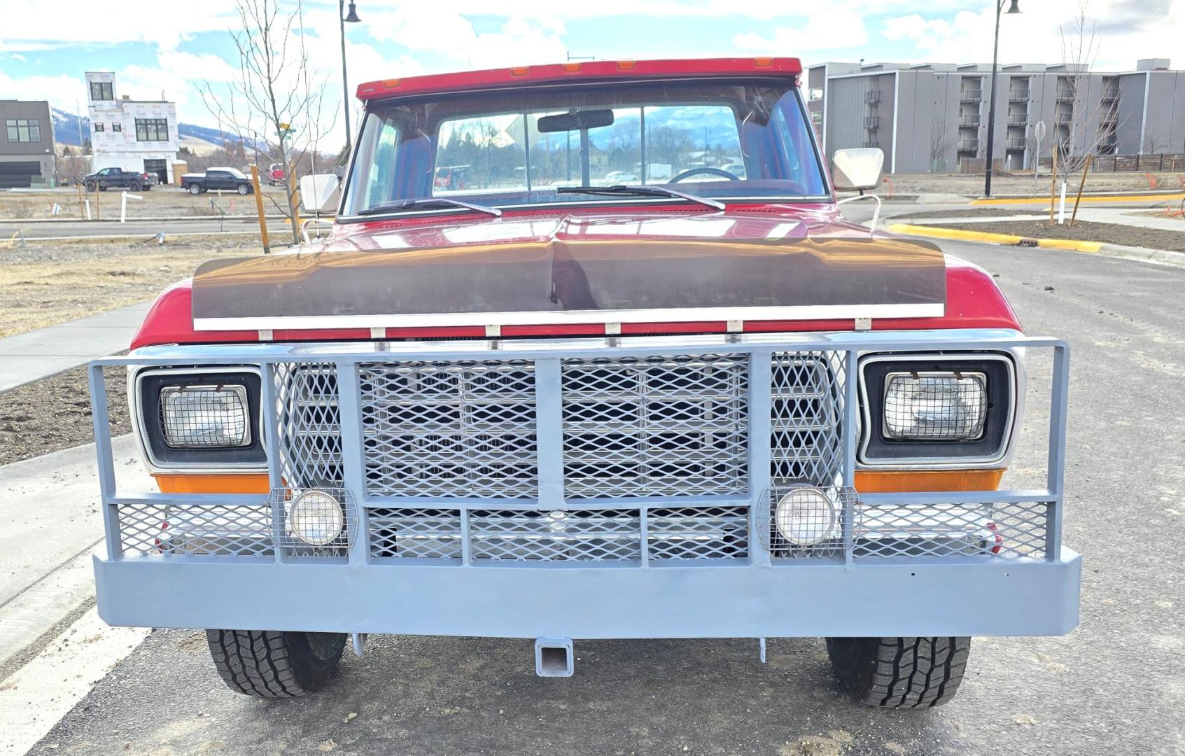 1979 Red and Silver /Red Ford F-150 Ranger (F15JREG8225) with an 460 V8 engine, Automatic transmission, located at 450 N Russell, Missoula, MT, 59801, (406) 543-6600, 46.874496, -114.017433 - This sharp-looking classic Ford pickup offers a unique blend of components. Although the title lists it as an F150 due to a cab replacement—the new cab being a 1/2 ton with an F150 VIN number—the rest of the vehicle is essentially an F250. All major features except the cab reflect a 3/4 ton conf - Photo#5