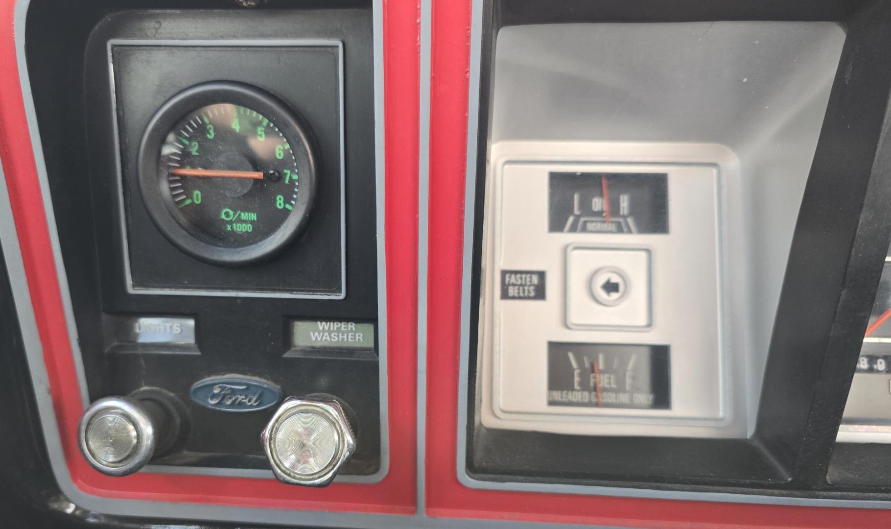 1979 Red and Silver /Red Ford F-150 Ranger (F15JREG8225) with an 460 V8 engine, Automatic transmission, located at 450 N Russell, Missoula, MT, 59801, (406) 543-6600, 46.874496, -114.017433 - This sharp-looking classic Ford pickup offers a unique blend of components. Although the title lists it as an F150 due to a cab replacement—the new cab being a 1/2 ton with an F150 VIN number—the rest of the vehicle is essentially an F250. All major features except the cab reflect a 3/4 ton conf - Photo#21