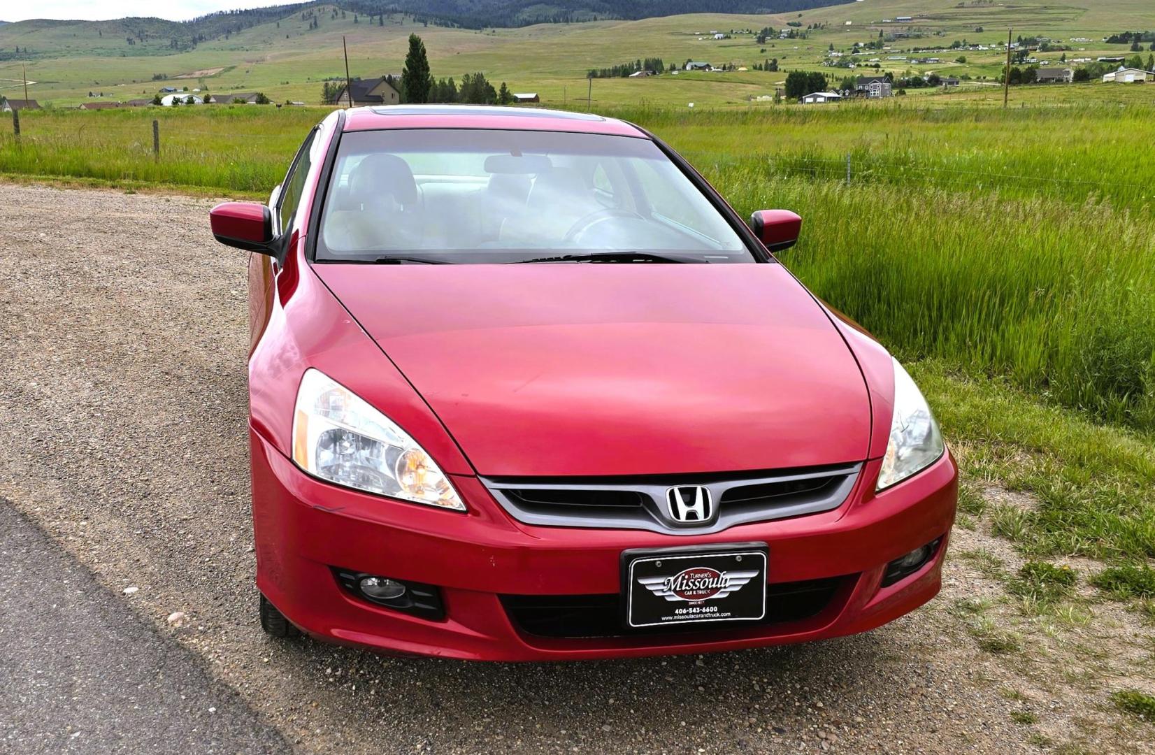 2006 Red /Tan Honda Accord EX V-6 Coupe w/ Nav/ XM Radio (1HGCM81736A) with an 3.0L V6 SOHC 24V engine, 6-Speed Manual Overdrive transmission, located at 450 N Russell, Missoula, MT, 59801, (406) 543-6600, 46.874496, -114.017433 - Another Unicorn! One Owner 06 Accord Coupe with a 6 Speed Manual Transmission. 3.0L V6 Engine. Navigation. AM FM 6 Disc Changer. Air. Cruise. Tilt. Sunroof. Power Windows and Locks. Power Drivers Seat. Heated Seats. Front Wheel Drive. All this and still under 100K Miles! Front seats wear showing wea - Photo#7