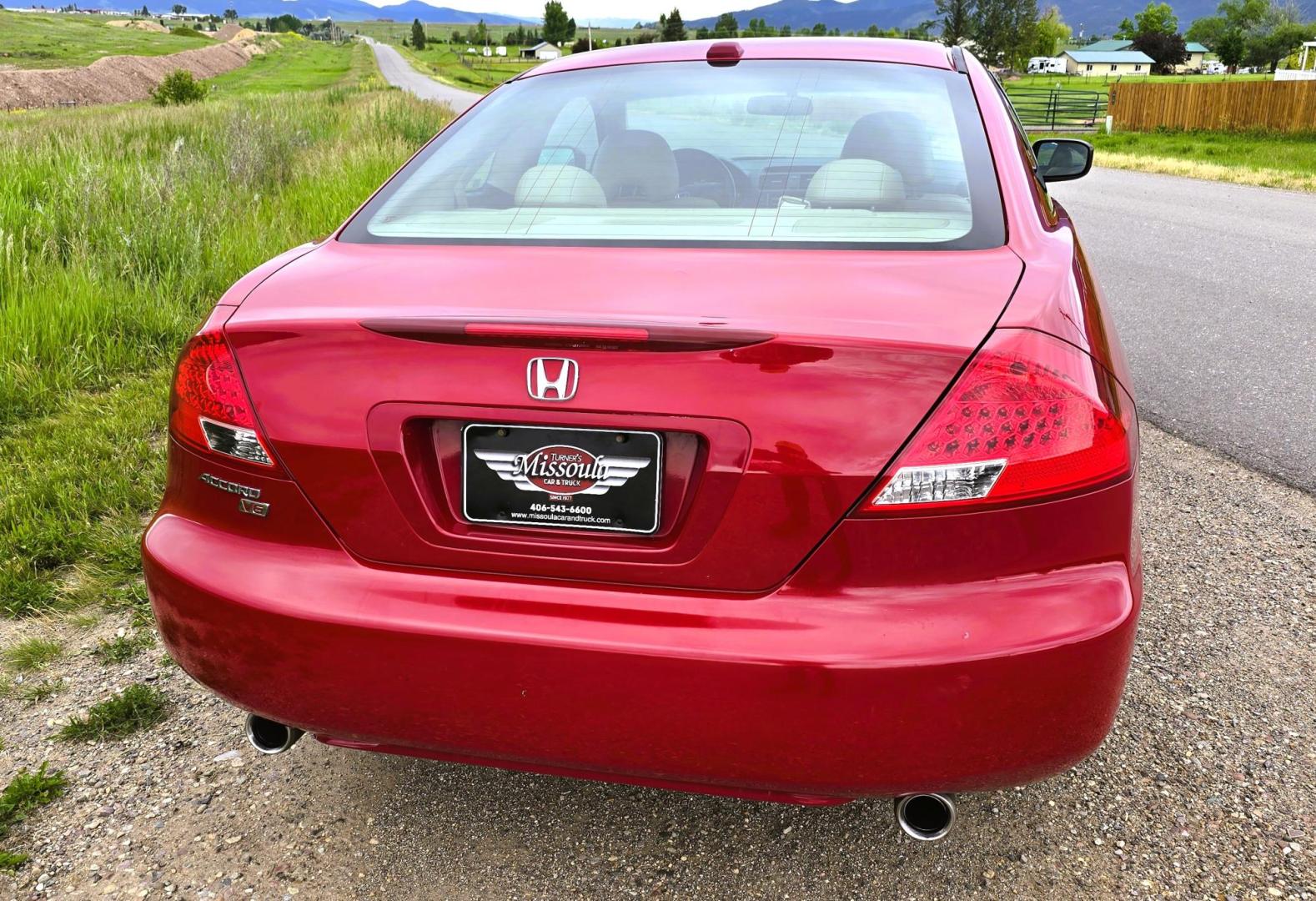 2006 Red /Tan Honda Accord EX V-6 Coupe w/ Nav/ XM Radio (1HGCM81736A) with an 3.0L V6 SOHC 24V engine, 6-Speed Manual Overdrive transmission, located at 450 N Russell, Missoula, MT, 59801, (406) 543-6600, 46.874496, -114.017433 - Another Unicorn! One Owner 06 Accord Coupe with a 6 Speed Manual Transmission. 3.0L V6 Engine. Navigation. AM FM 6 Disc Changer. Air. Cruise. Tilt. Sunroof. Power Windows and Locks. Power Drivers Seat. Heated Seats. Front Wheel Drive. All this and still under 100K Miles! Front seats wear showing wea - Photo#10