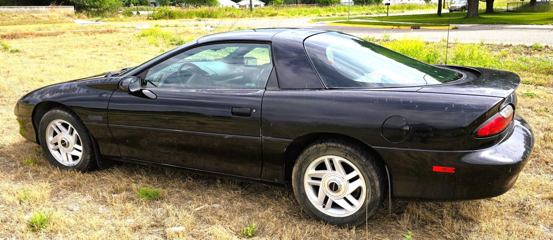 1993 Black /Gray Chevrolet Camaro Z28 coupe (2G1FP22P2P2) with an 5.7L V8 OHV 12V engine, Automatic transmission, located at 450 N Russell, Missoula, MT, 59801, (406) 543-6600, 46.874496, -114.017433 - 1993 Chevy Camaro with a 5.7L V8 Engine that runs great. The downside is the Transmission is on it's last legs. It will run great for a while then it will not shift. Selling as a parts or project car. Air Conditioning Blows cold. Power Windows work. Like I said the engine is strong. Interior is pret- Photo#1