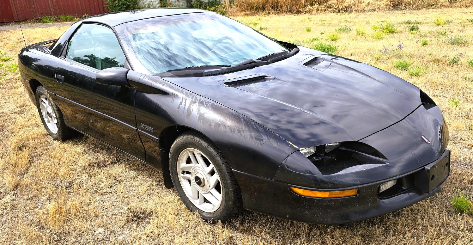 1993 Black /Gray Chevrolet Camaro Z28 coupe (2G1FP22P2P2) with an 5.7L V8 OHV 12V engine, Automatic transmission, located at 450 N Russell, Missoula, MT, 59801, (406) 543-6600, 46.874496, -114.017433 - 1993 Chevy Camaro with a 5.7L V8 Engine that runs great. The downside is the Transmission is on it's last legs. It will run great for a while then it will not shift. Selling as a parts or project car. Air Conditioning Blows cold. Power Windows work. Like I said the engine is strong. Interior is pret- Photo#5