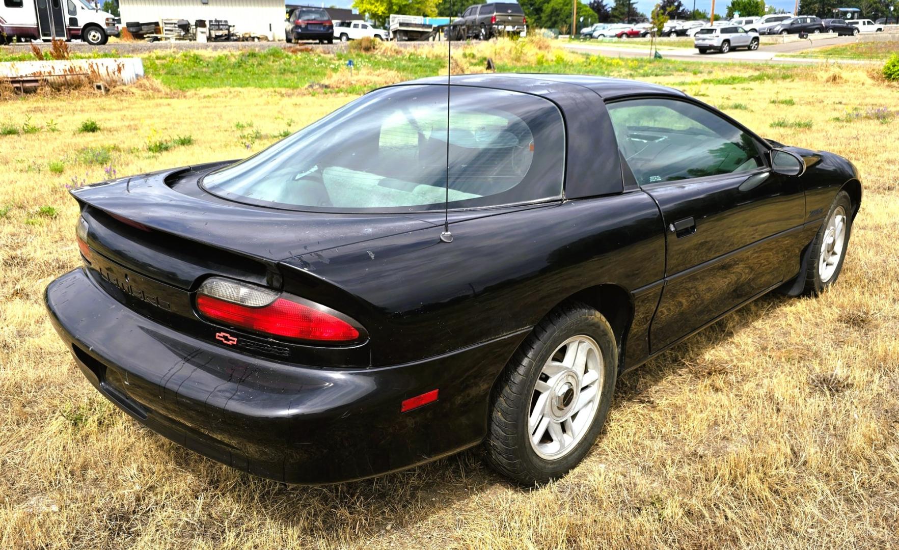 1993 Black /Gray Chevrolet Camaro Z28 coupe (2G1FP22P2P2) with an 5.7L V8 OHV 12V engine, Automatic transmission, located at 450 N Russell, Missoula, MT, 59801, (406) 543-6600, 46.874496, -114.017433 - 1993 Chevy Camaro with a 5.7L V8 Engine that runs great. The downside is the Transmission is on it's last legs. It will run great for a while then it will not shift. Selling as a parts or project car. Air Conditioning Blows cold. Power Windows work. Like I said the engine is strong. Interior is pret- Photo#3