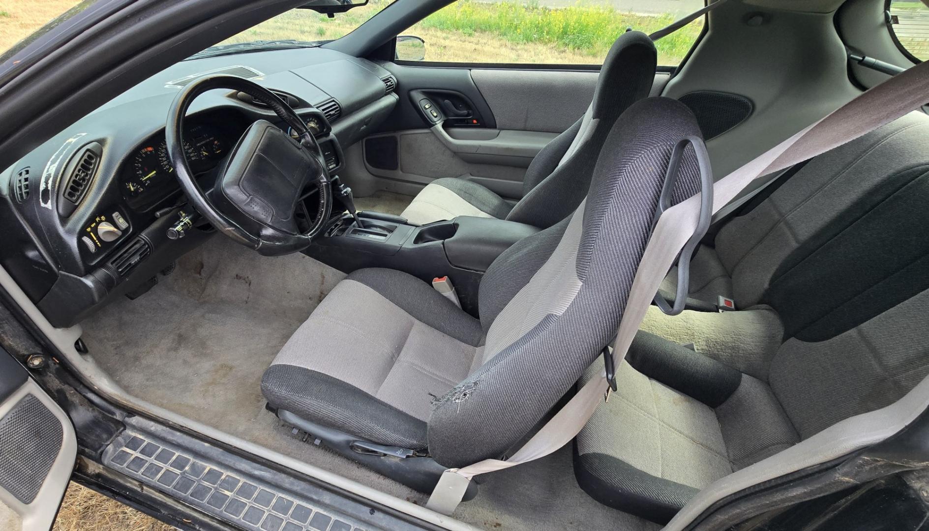 1993 Black /Gray Chevrolet Camaro Z28 coupe (2G1FP22P2P2) with an 5.7L V8 OHV 12V engine, Automatic transmission, located at 450 N Russell, Missoula, MT, 59801, (406) 543-6600, 46.874496, -114.017433 - 1993 Chevy Camaro with a 5.7L V8 Engine that runs great. The downside is the Transmission is on it's last legs. It will run great for a while then it will not shift. Selling as a parts or project car. Air Conditioning Blows cold. Power Windows work. Like I said the engine is strong. Interior is pret- Photo#8