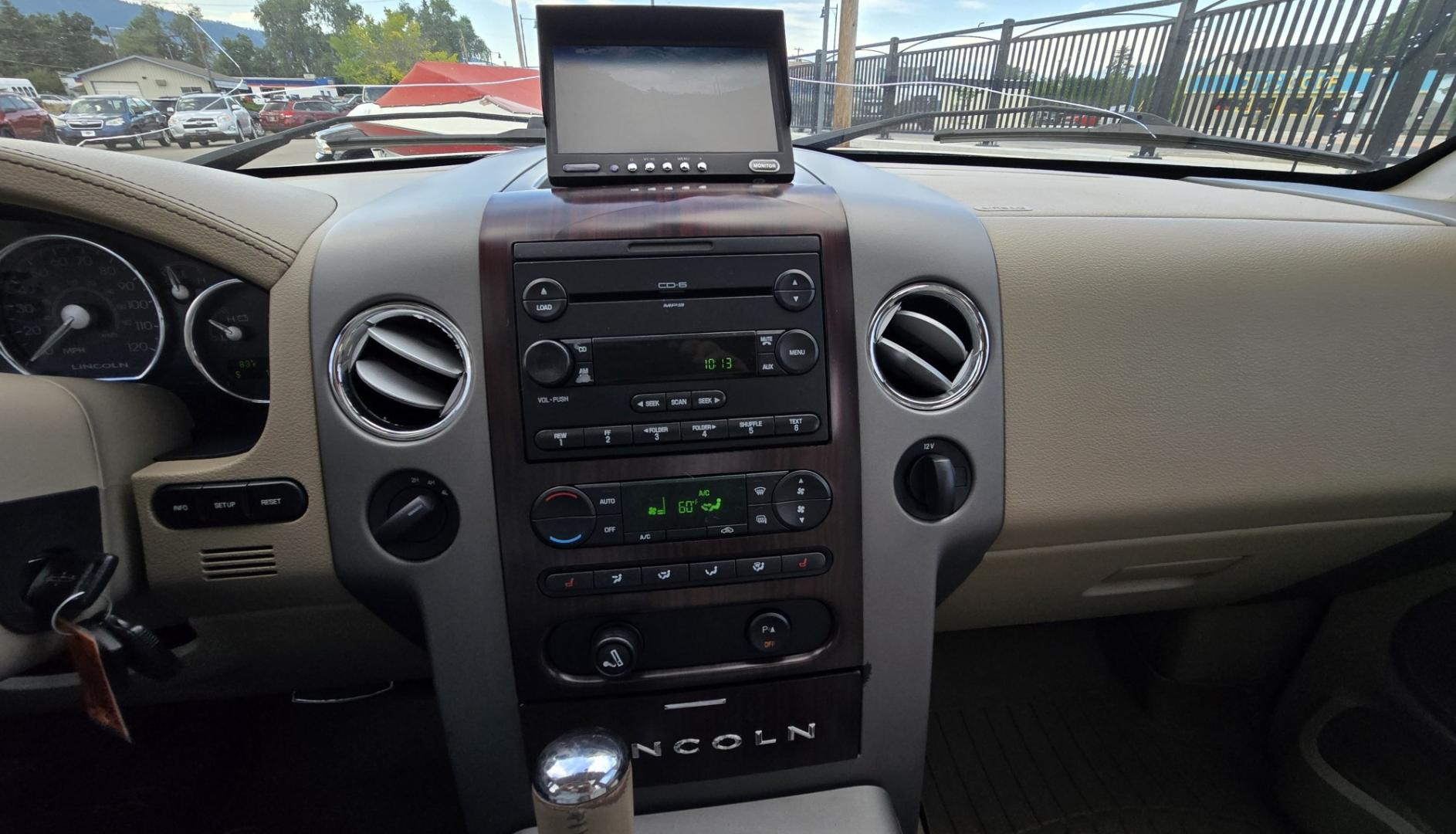 2006 Tan /Gray Lincoln Mark LT 4WD (5LTPW18596F) with an 5.4L V8 SOHC 24V engine, 4A OD transmission, located at 450 N Russell, Missoula, MT, 59801, (406) 543-6600, 46.874496, -114.017433 - Smooth Driving Lincoln 4WD Pickup. 5.4L V8 Engine. Power Seats. Heated Front Seats. Air. Cruise. Tilt. Power Windows and Locks. Excellent Goodrich Tires. Running Boards. Aftermarket Rear View Camera. Clean Title and Carfax. Does have an Airbag light on. Because of the age, our lenders do NOT off- Photo#17