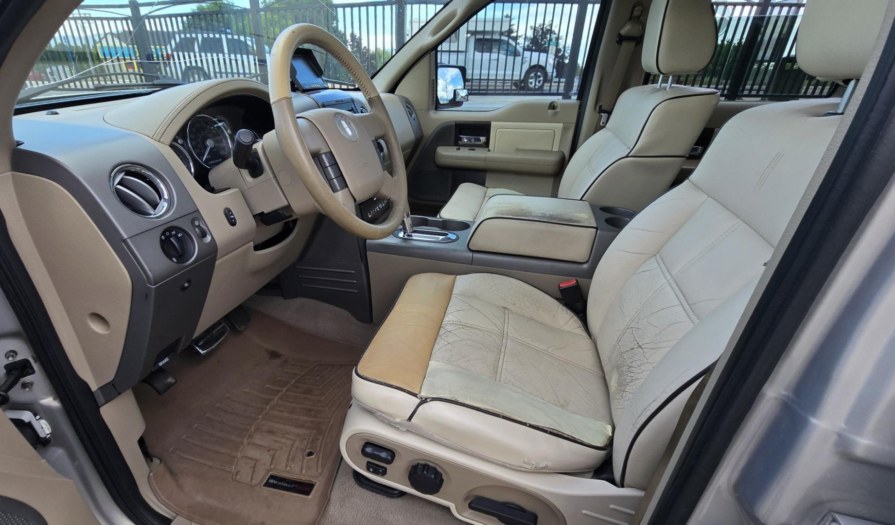 2006 Tan /Gray Lincoln Mark LT 4WD (5LTPW18596F) with an 5.4L V8 SOHC 24V engine, 4A OD transmission, located at 450 N Russell, Missoula, MT, 59801, (406) 543-6600, 46.874496, -114.017433 - Smooth Driving Lincoln 4WD Pickup. 5.4L V8 Engine. Power Seats. Heated Front Seats. Air. Cruise. Tilt. Power Windows and Locks. Excellent Goodrich Tires. Running Boards. Aftermarket Rear View Camera. Clean Title and Carfax. Does have an Airbag light on. Because of the age, our lenders do NOT off- Photo#16