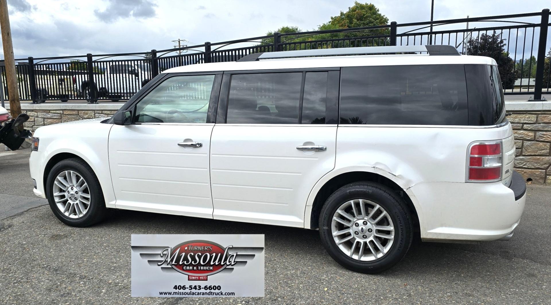 2015 White Ford Flex SEL AWD (2FMHK6C84FB) with an 3.5L V6 DOHC 24V engine, 6A transmission, located at 450 N Russell, Missoula, MT, 59801, (406) 543-6600, 46.874496, -114.017433 - Rare Find. Ford Flex AWD. 2.5L V6 Engine. The Good News is it Runs and Drives Amazing and only has 128K Miles. The bad news is there are a couple good sized dents. Air Conditioning Blows Cold. AM FM CD Player. 3rd Row Seating. Backup Camera. Power Front Seats. Touch Screen isn't working so the heate- Photo#2