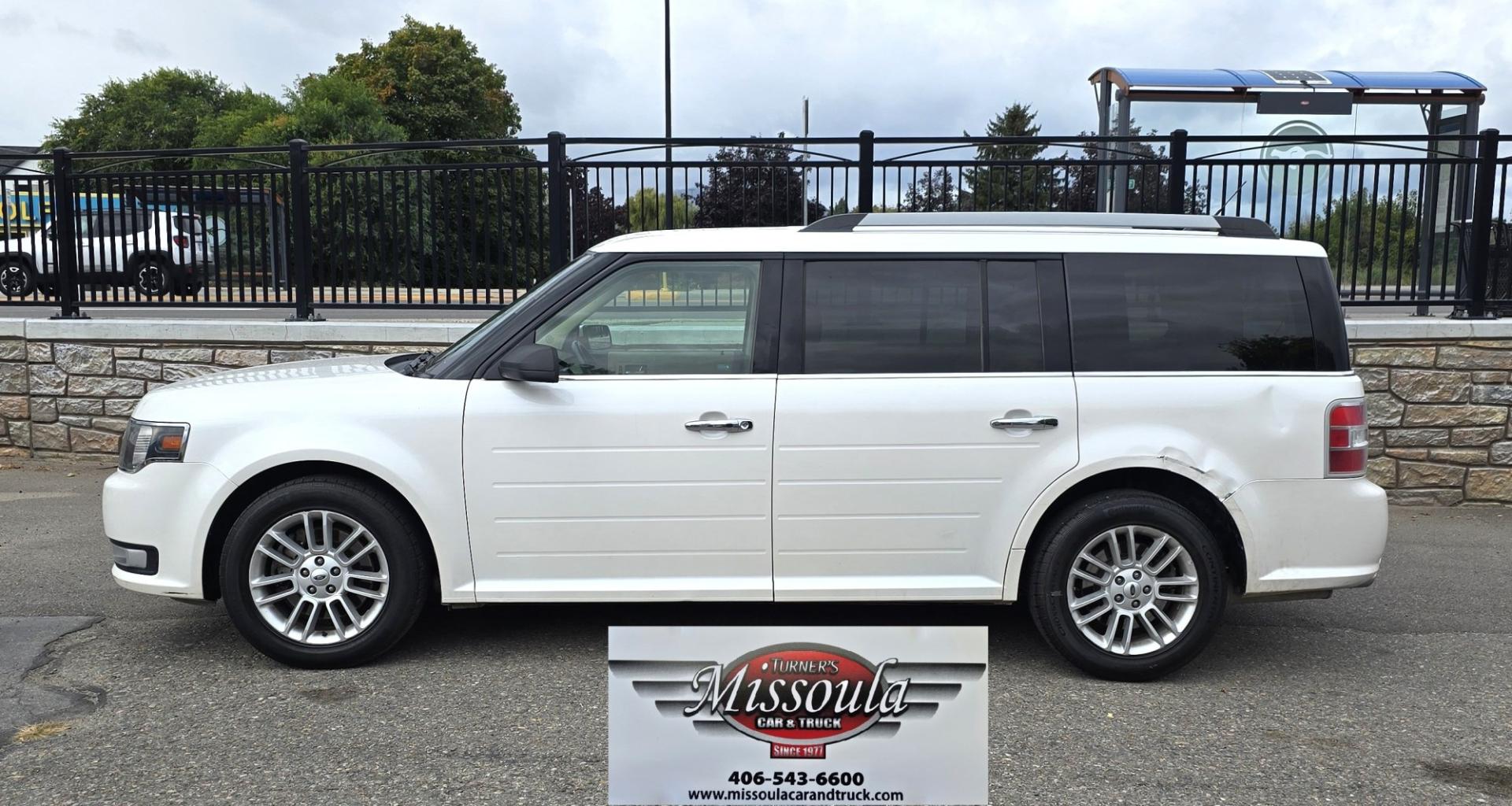 2015 White Ford Flex SEL AWD (2FMHK6C84FB) with an 3.5L V6 DOHC 24V engine, 6A transmission, located at 450 N Russell, Missoula, MT, 59801, (406) 543-6600, 46.874496, -114.017433 - Rare Find. Ford Flex AWD. 2.5L V6 Engine. The Good News is it Runs and Drives Amazing and only has 128K Miles. The bad news is there are a couple good sized dents. Air Conditioning Blows Cold. AM FM CD Player. 3rd Row Seating. Backup Camera. Power Front Seats. Touch Screen isn't working so the heate- Photo#1