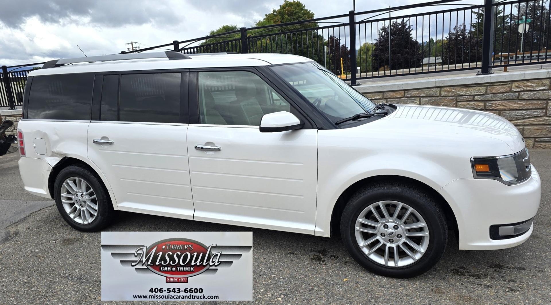 2015 White Ford Flex SEL AWD (2FMHK6C84FB) with an 3.5L V6 DOHC 24V engine, 6A transmission, located at 450 N Russell, Missoula, MT, 59801, (406) 543-6600, 46.874496, -114.017433 - Rare Find. Ford Flex AWD. 2.5L V6 Engine. The Good News is it Runs and Drives Amazing and only has 128K Miles. The bad news is there are a couple good sized dents. Air Conditioning Blows Cold. AM FM CD Player. 3rd Row Seating. Backup Camera. Power Front Seats. Touch Screen isn't working so the heate- Photo#4