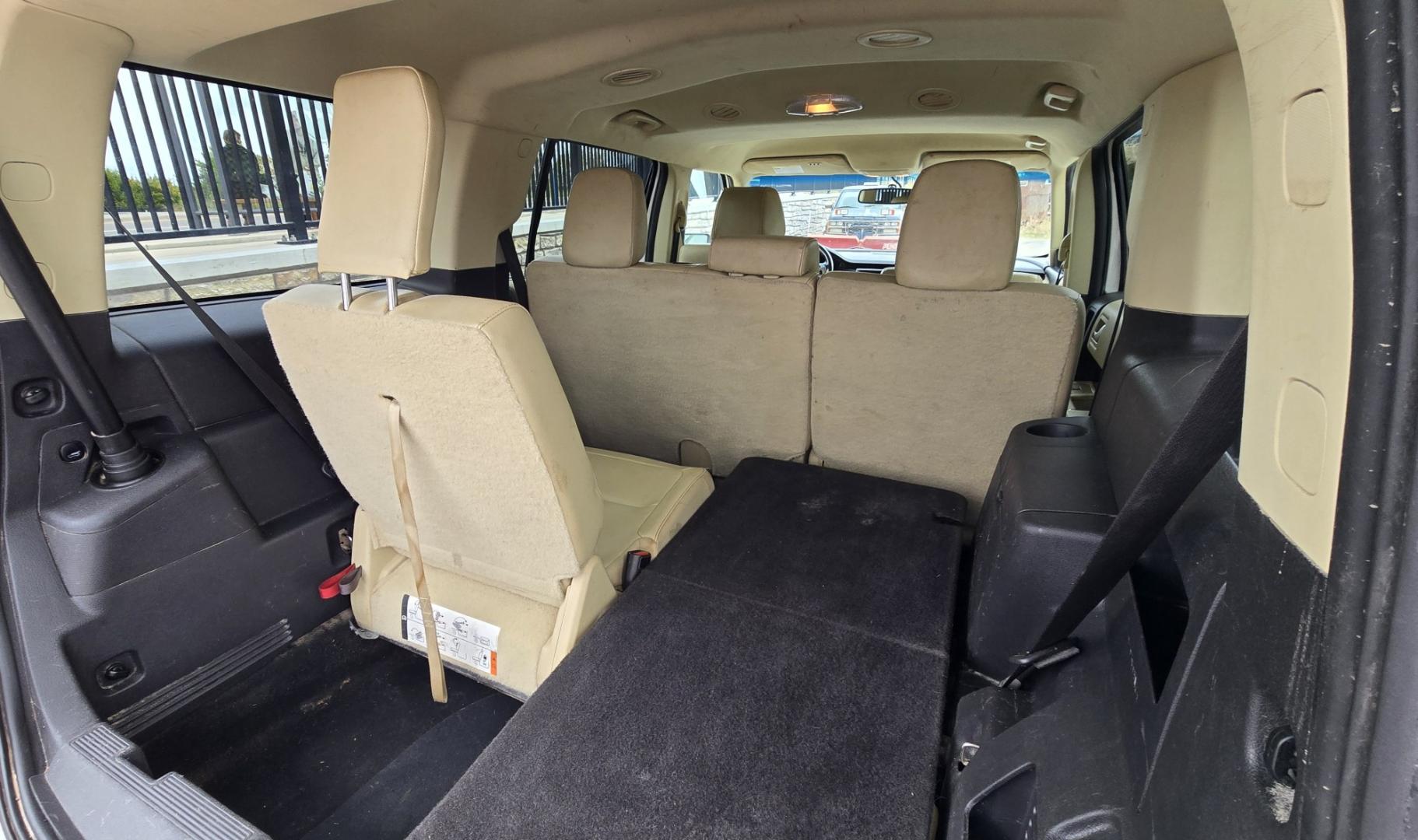 2015 White Ford Flex SEL AWD (2FMHK6C84FB) with an 3.5L V6 DOHC 24V engine, 6A transmission, located at 450 N Russell, Missoula, MT, 59801, (406) 543-6600, 46.874496, -114.017433 - Rare Find. Ford Flex AWD. 2.5L V6 Engine. The Good News is it Runs and Drives Amazing and only has 128K Miles. The bad news is there are a couple good sized dents. Air Conditioning Blows Cold. AM FM CD Player. 3rd Row Seating. Backup Camera. Power Front Seats. Touch Screen isn't working so the heate- Photo#11