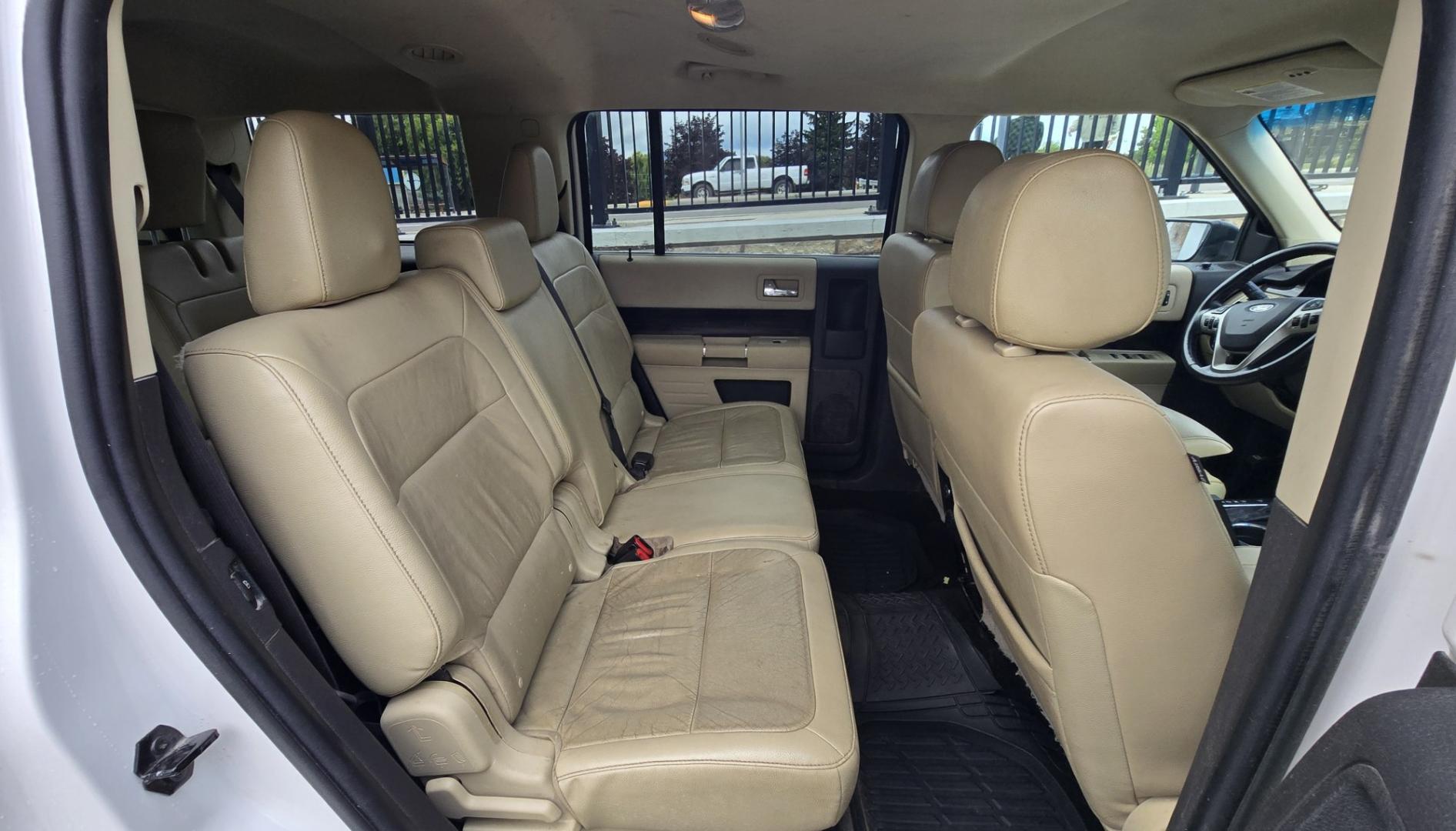 2015 White Ford Flex SEL AWD (2FMHK6C84FB) with an 3.5L V6 DOHC 24V engine, 6A transmission, located at 450 N Russell, Missoula, MT, 59801, (406) 543-6600, 46.874496, -114.017433 - Rare Find. Ford Flex AWD. 2.5L V6 Engine. The Good News is it Runs and Drives Amazing and only has 128K Miles. The bad news is there are a couple good sized dents. Air Conditioning Blows Cold. AM FM CD Player. 3rd Row Seating. Backup Camera. Power Front Seats. Touch Screen isn't working so the heate- Photo#12