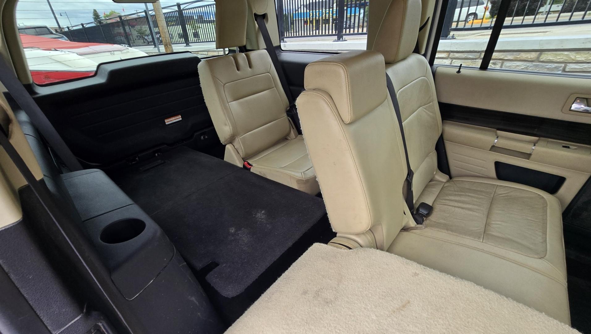 2015 White Ford Flex SEL AWD (2FMHK6C84FB) with an 3.5L V6 DOHC 24V engine, 6A transmission, located at 450 N Russell, Missoula, MT, 59801, (406) 543-6600, 46.874496, -114.017433 - Rare Find. Ford Flex AWD. 2.5L V6 Engine. The Good News is it Runs and Drives Amazing and only has 128K Miles. The bad news is there are a couple good sized dents. Air Conditioning Blows Cold. AM FM CD Player. 3rd Row Seating. Backup Camera. Power Front Seats. Touch Screen isn't working so the heate- Photo#13