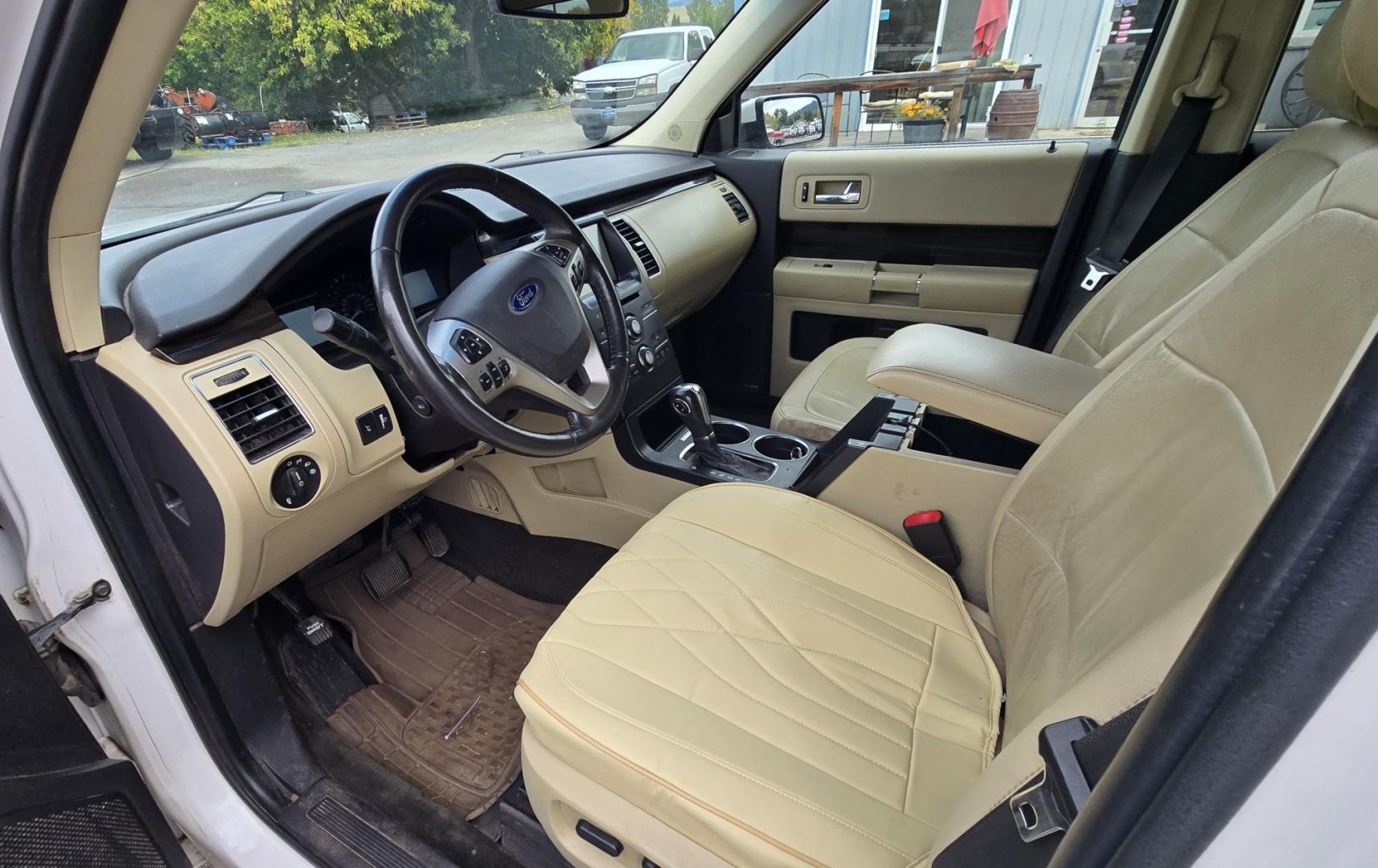2015 White Ford Flex SEL AWD (2FMHK6C84FB) with an 3.5L V6 DOHC 24V engine, 6A transmission, located at 450 N Russell, Missoula, MT, 59801, (406) 543-6600, 46.874496, -114.017433 - Rare Find. Ford Flex AWD. 2.5L V6 Engine. The Good News is it Runs and Drives Amazing and only has 128K Miles. The bad news is there are a couple good sized dents. Air Conditioning Blows Cold. AM FM CD Player. 3rd Row Seating. Backup Camera. Power Front Seats. Touch Screen isn't working so the heate- Photo#16