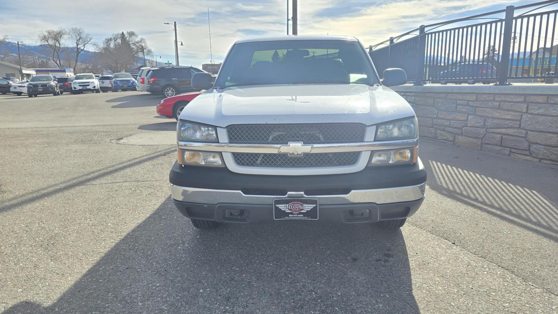2003 White /Grey Cloth Chevrolet 1500 (4 Wheel Drive) Silverado 1500 LS (1GCEK19T73E) with an 5.3L V8 SFI engine, Automatic with Overdrive transmission, located at 450 N Russell, Missoula, MT, 59801, (406) 543-6600, 46.874496, -114.017433 - Nice Two Owner Extended Cab Long Box 4 Wheel Drive with a Clean Title and Carfax. 5.3L V8 Engine. Automatic Transmission. Air Conditioning. Cruise Control. Power Windows and Locks. Tires are in New Condition. Because of the age. Financing is NOT Available through our lenders. - Photo#4
