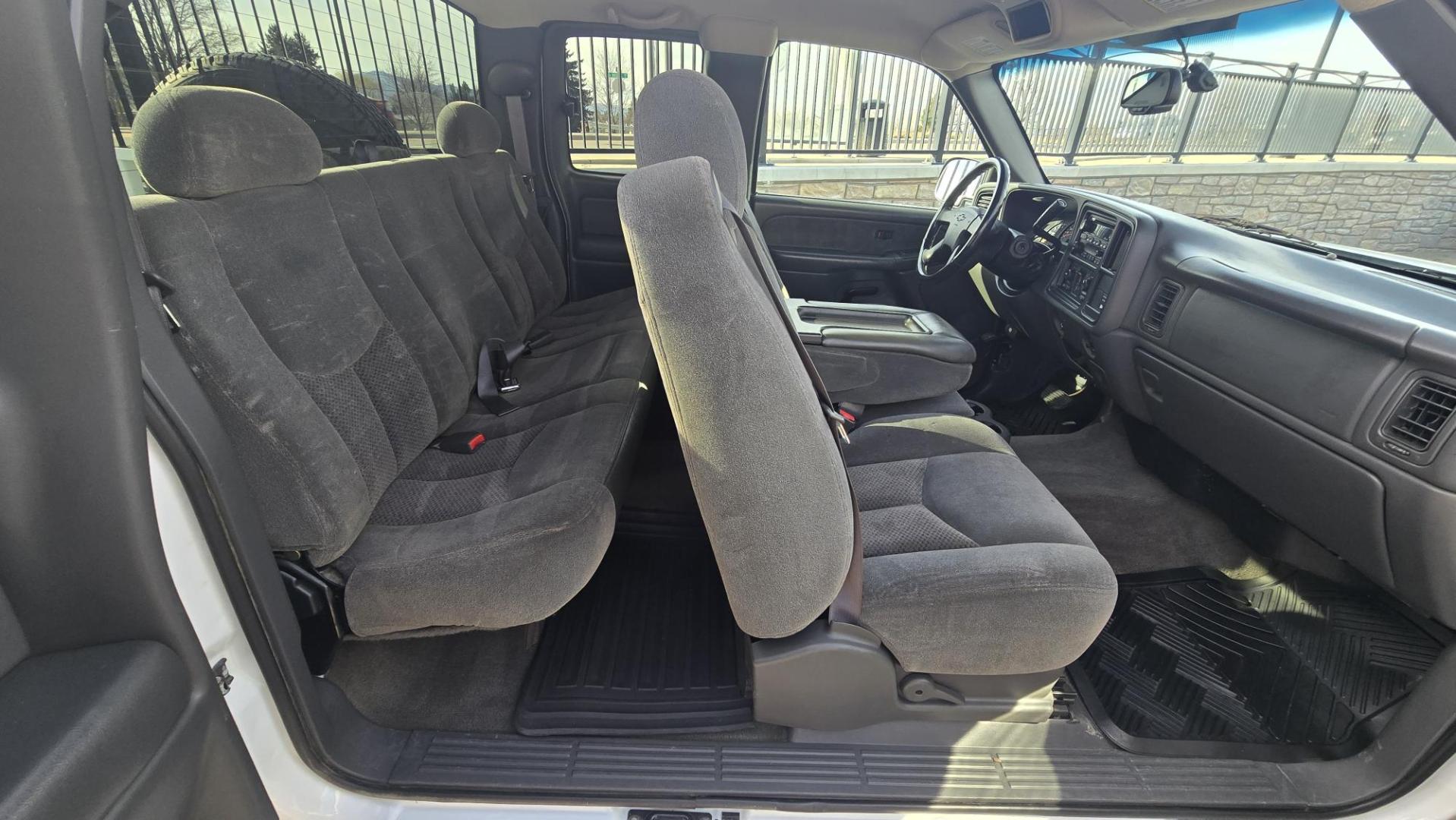 2003 White /Grey Cloth Chevrolet 1500 (4 Wheel Drive) Silverado 1500 LS (1GCEK19T73E) with an 5.3L V8 SFI engine, Automatic with Overdrive transmission, located at 450 N Russell, Missoula, MT, 59801, (406) 543-6600, 46.874496, -114.017433 - Nice Two Owner Extended Cab Long Box 4 Wheel Drive with a Clean Title and Carfax. 5.3L V8 Engine. Automatic Transmission. Air Conditioning. Cruise Control. Power Windows and Locks. Tires are in New Condition. Because of the age. Financing is NOT Available through our lenders. - Photo#10