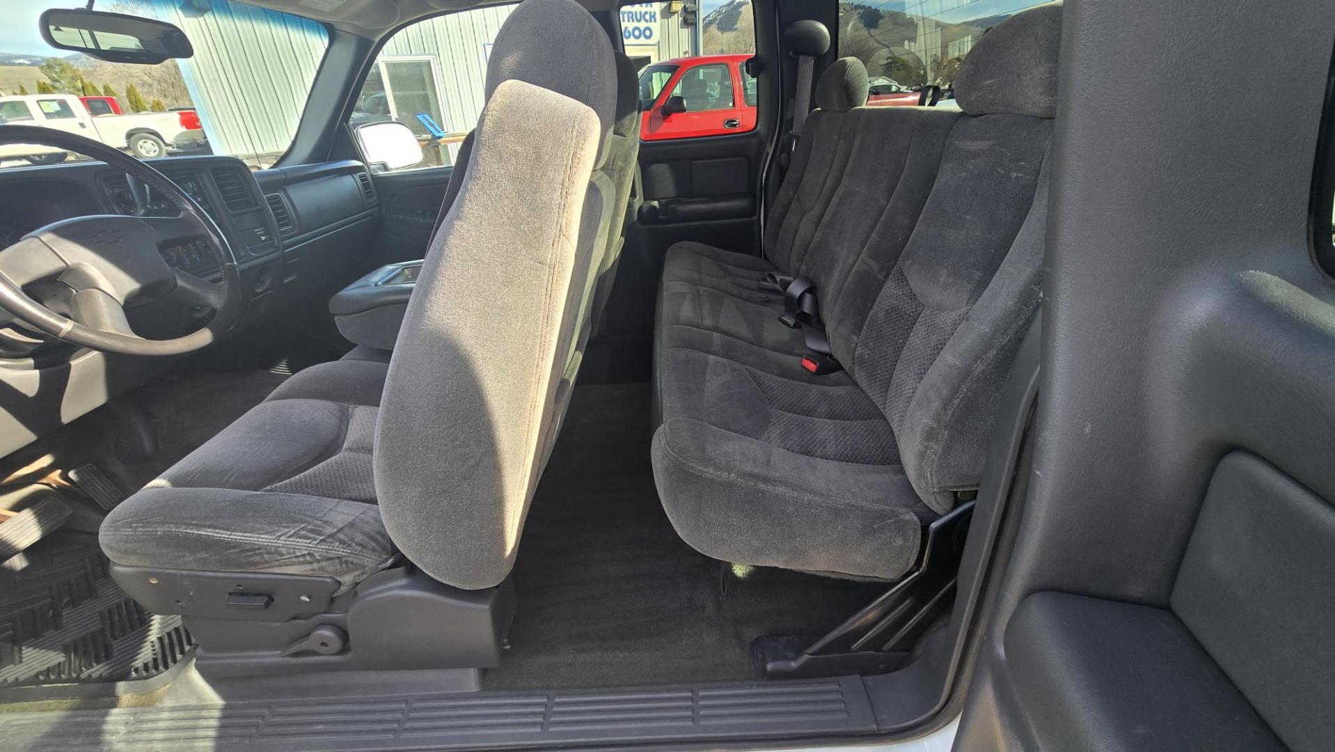 2003 White /Grey Cloth Chevrolet 1500 (4 Wheel Drive) Silverado 1500 LS (1GCEK19T73E) with an 5.3L V8 SFI engine, Automatic with Overdrive transmission, located at 450 N Russell, Missoula, MT, 59801, (406) 543-6600, 46.874496, -114.017433 - Nice Two Owner Extended Cab Long Box 4 Wheel Drive with a Clean Title and Carfax. 5.3L V8 Engine. Automatic Transmission. Air Conditioning. Cruise Control. Power Windows and Locks. Tires are in New Condition. Because of the age. Financing is NOT Available through our lenders. - Photo#12