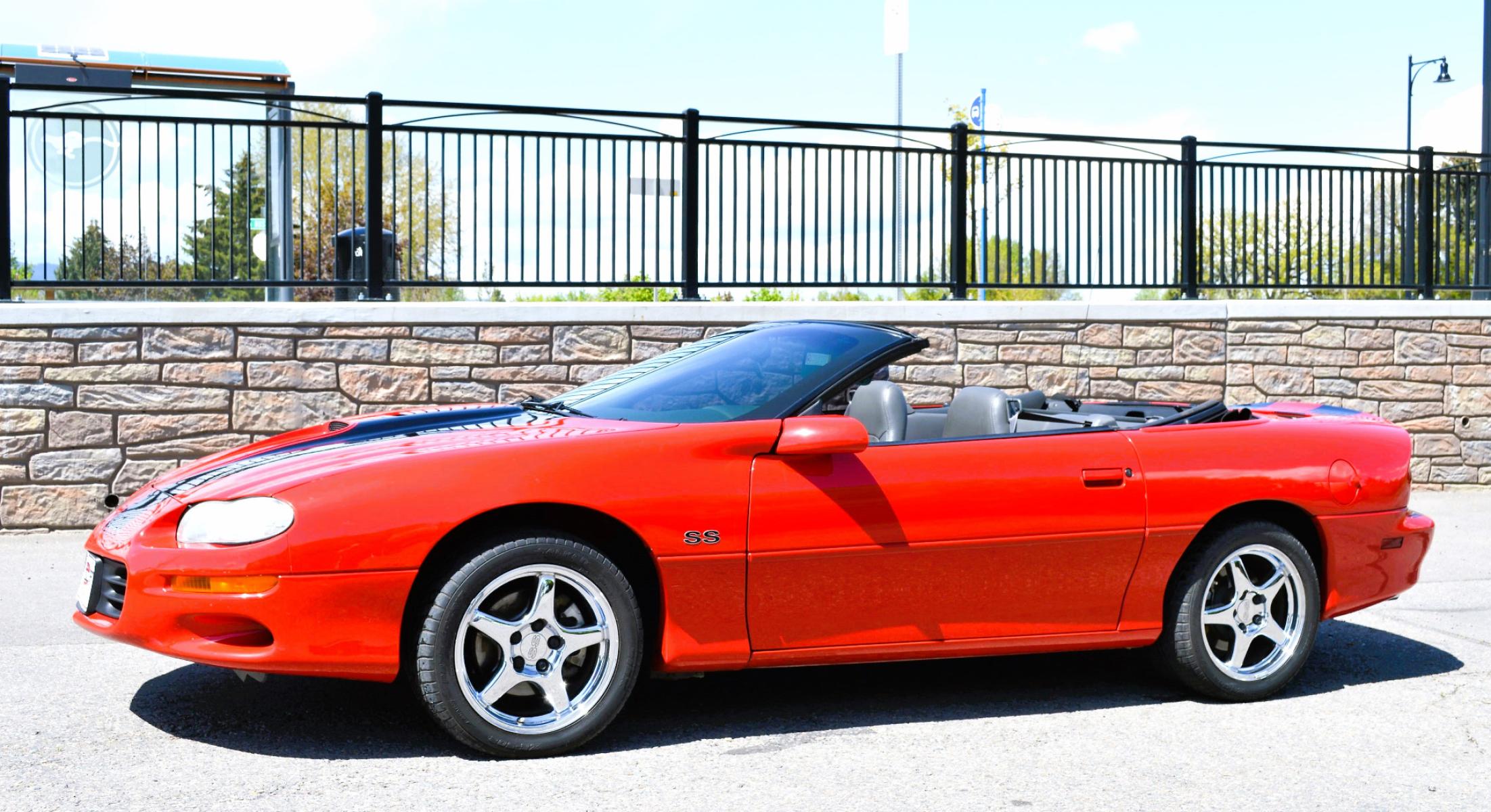 1999 Red /Black Leather Chevrolet Camaro (2G1FP32G6X2) with an 5.7L V8 MPI "LS1" engine, 6 Speed Manual transmission, located at 450 N Russell, Missoula, MT, 59801, (406) 543-6600, 46.874496, -114.017433 - Truly a beautiful car we sold this beauty about 10 years ago and was driven a few hundred miles in that time and was stored indoors Runs,drives and looks as it should all original no modifications True SS convertible with SLP upgrades (we're not certain what those are exactly as there isn't - Photo #2