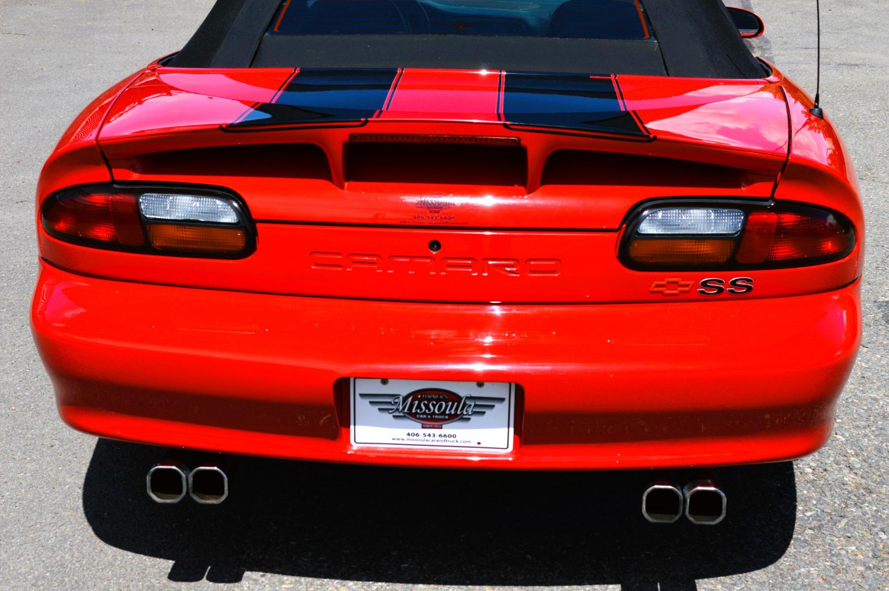 1999 Red /Black Leather Chevrolet Camaro (2G1FP32G6X2) with an 5.7L V8 MPI "LS1" engine, 6 Speed Manual transmission, located at 450 N Russell, Missoula, MT, 59801, (406) 543-6600, 46.874496, -114.017433 - Truly a beautiful car we sold this beauty about 10 years ago and was driven a few hundred miles in that time and was stored indoors Runs,drives and looks as it should all original no modifications True SS convertible with SLP upgrades (we're not certain what those are exactly as there isn't - Photo #7