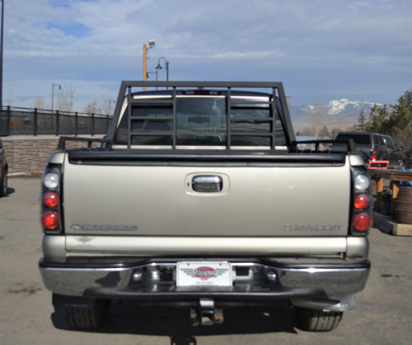 2000 Silver Birch Chevrolet 1500 "LS" (1GCEK19T3YZ) with an 5.3L V8 SFI engine, Automatic transmission, located at 450 N Russell, Missoula, MT, 59801, (406) 543-6600, 46.874496, -114.017433 - 4 Wheel Drive. Z71 Package. Towing. Head Rack. Air Conditioning. Power Windows. Runs Great! This vehicle is more then 20 years old and is not eligible for lending through our finance companies. - Photo #4