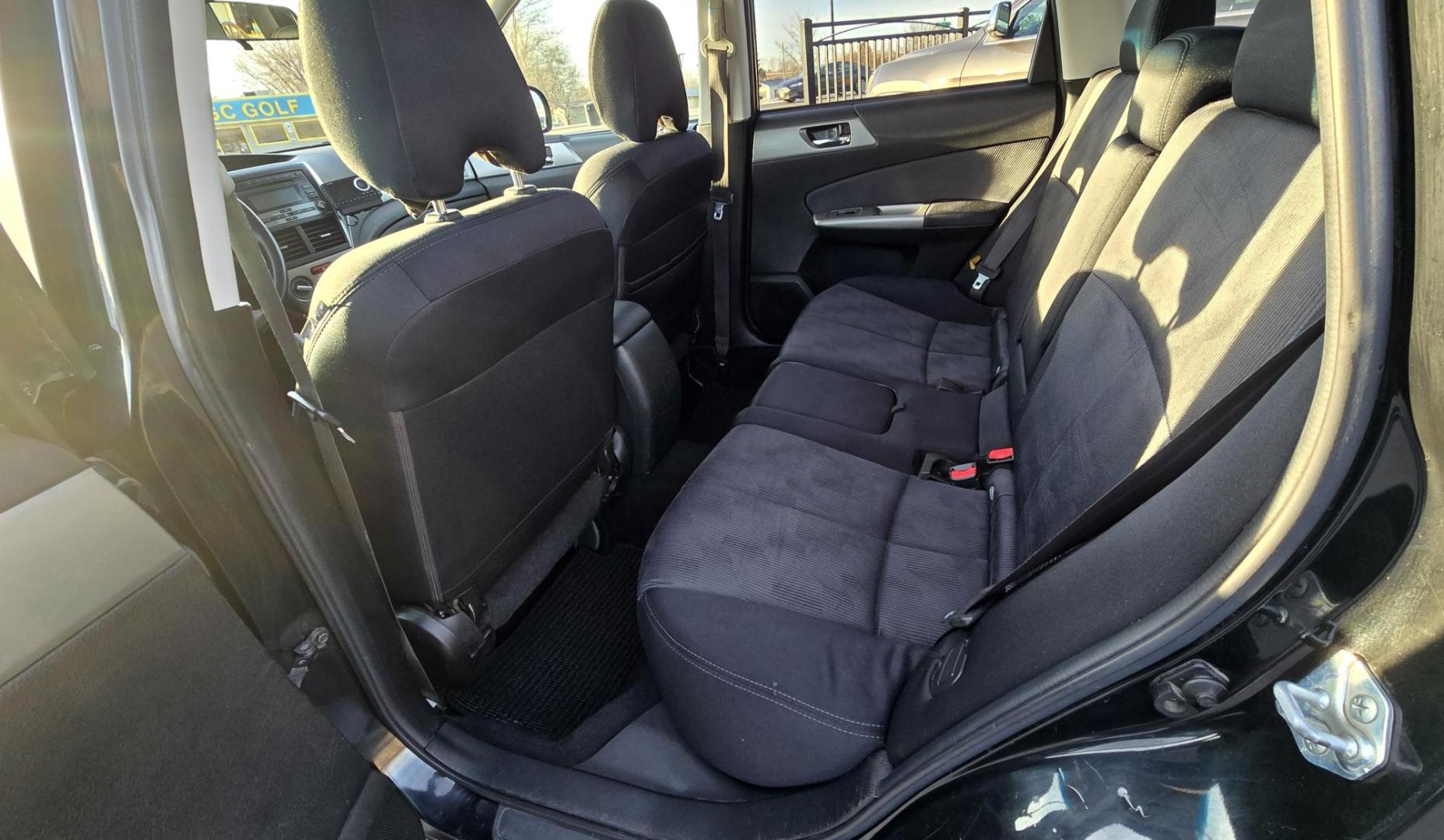 2009 Black /Grey Cloth Subaru Forester Premium (JF2SH63699H) with an 2.5L H4 SOHC 16V engine, 4-Speed Automatic transmission, located at 450 N Russell, Missoula, MT, 59801, (406) 543-6600, 46.874496, -114.017433 - Jet Black AWD Subaru. 2.5L Engine. Has all the necessary Subaru Maintenance. New Timing Belt. New Water Pump. New Head Gasket. New Radiator. Runs amazing. Automatic Transmission. Power Sunroof. Power Drivers Seat. Heated Front Seat.Air. Cruise. Tilt. Power Windows and Locks. Yokohama Tires. We Fin - Photo#5